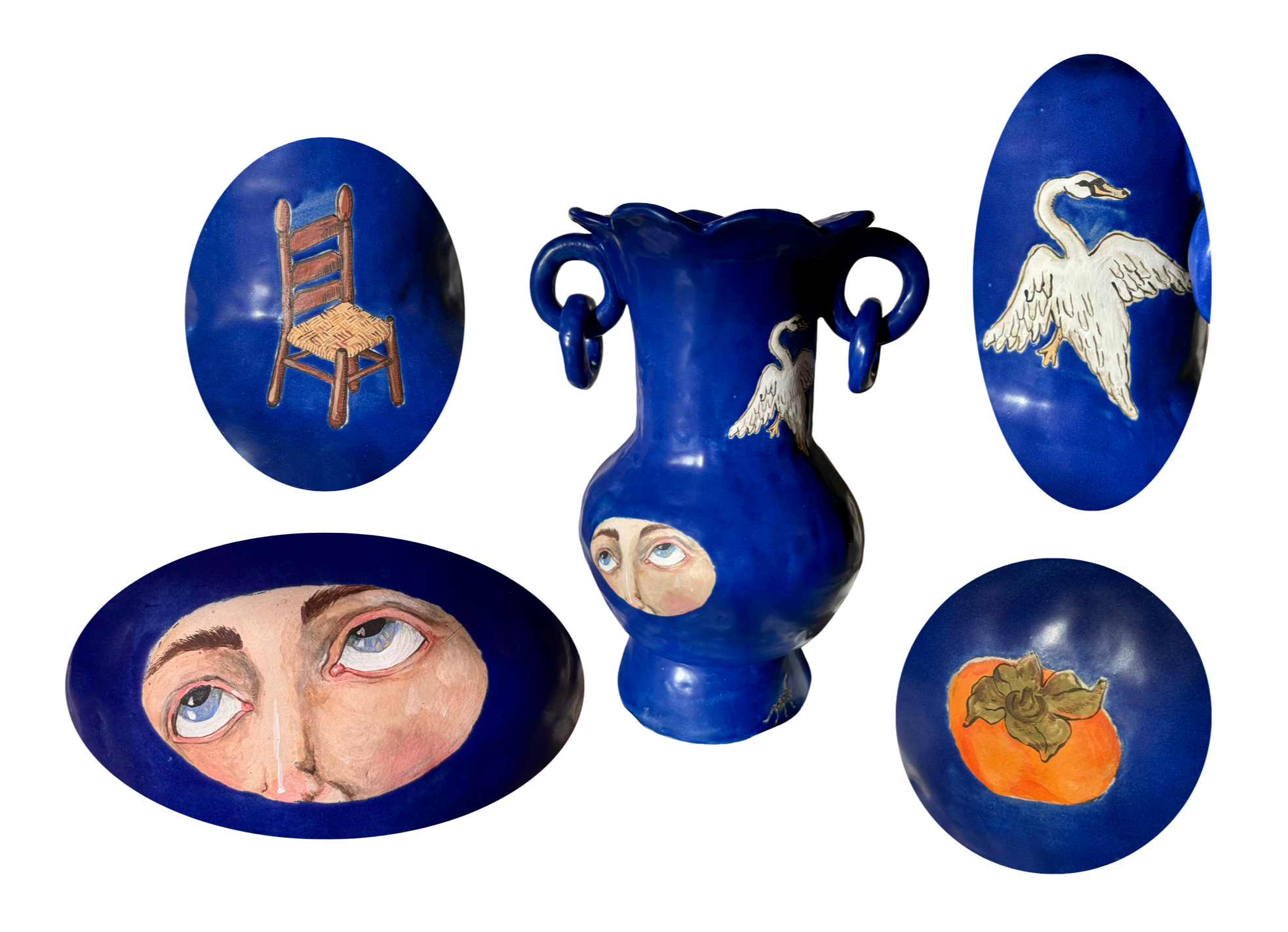 Hand built vase in cobalt blue with eyes, swan, persimmon and chair painted on in underglaze