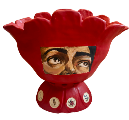 hand built coil vase in satin red glaze with an image of eyes looking upwards.