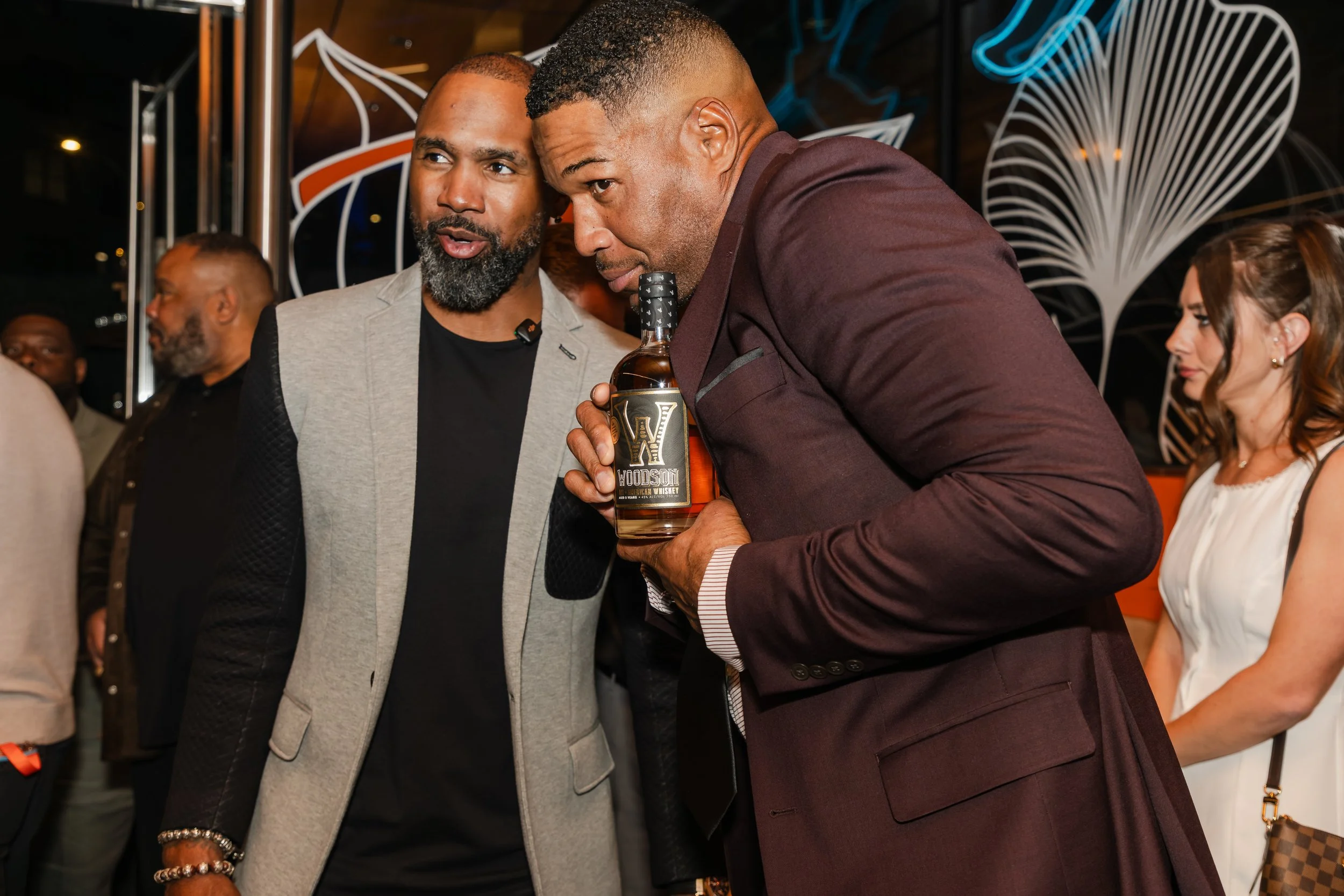 Charles Woodson & Michael Strahan