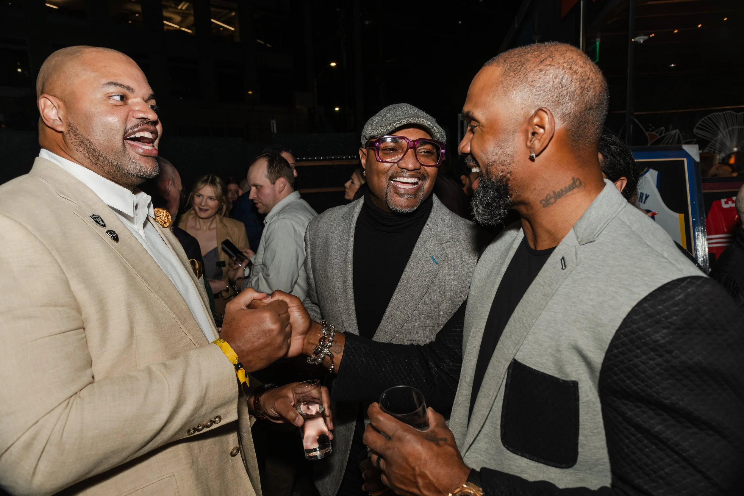 Grant Irons and Jarrett Irons with Charles Woodson