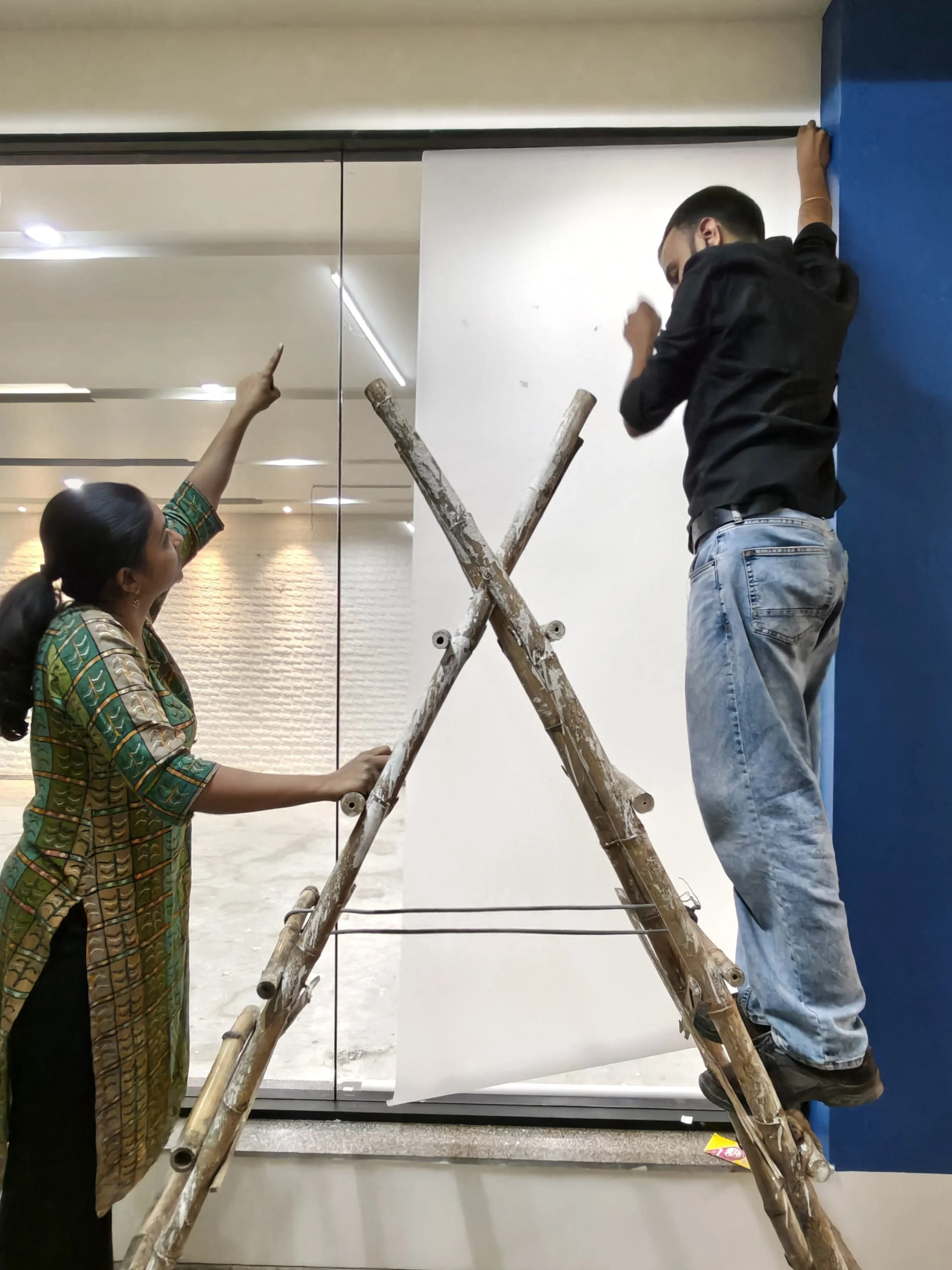 MFA students Hrishima and Vipin in preparation for the final show