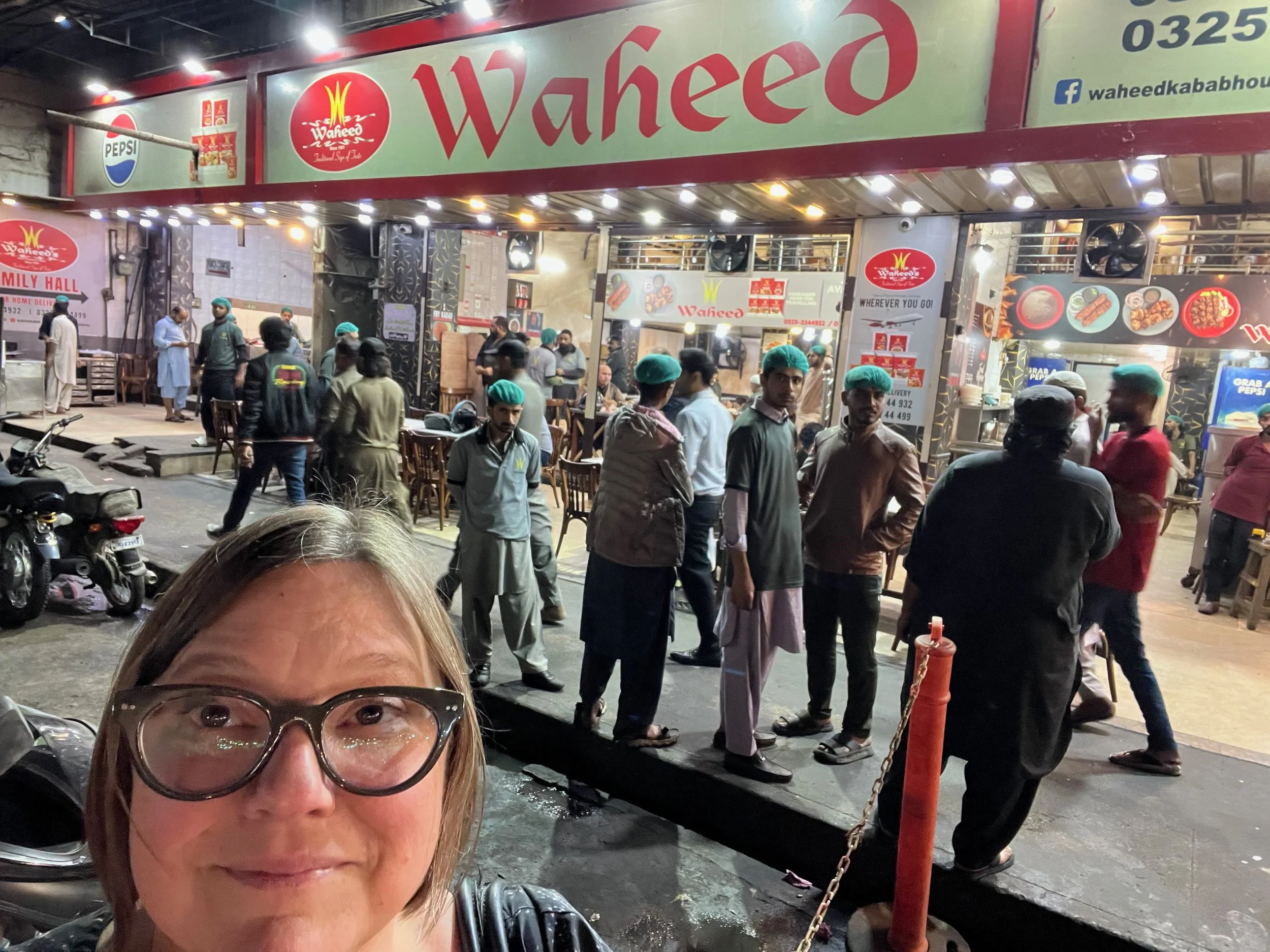 The scene outside of Waheed Kabab House, one of Karachi's best places for street food. 