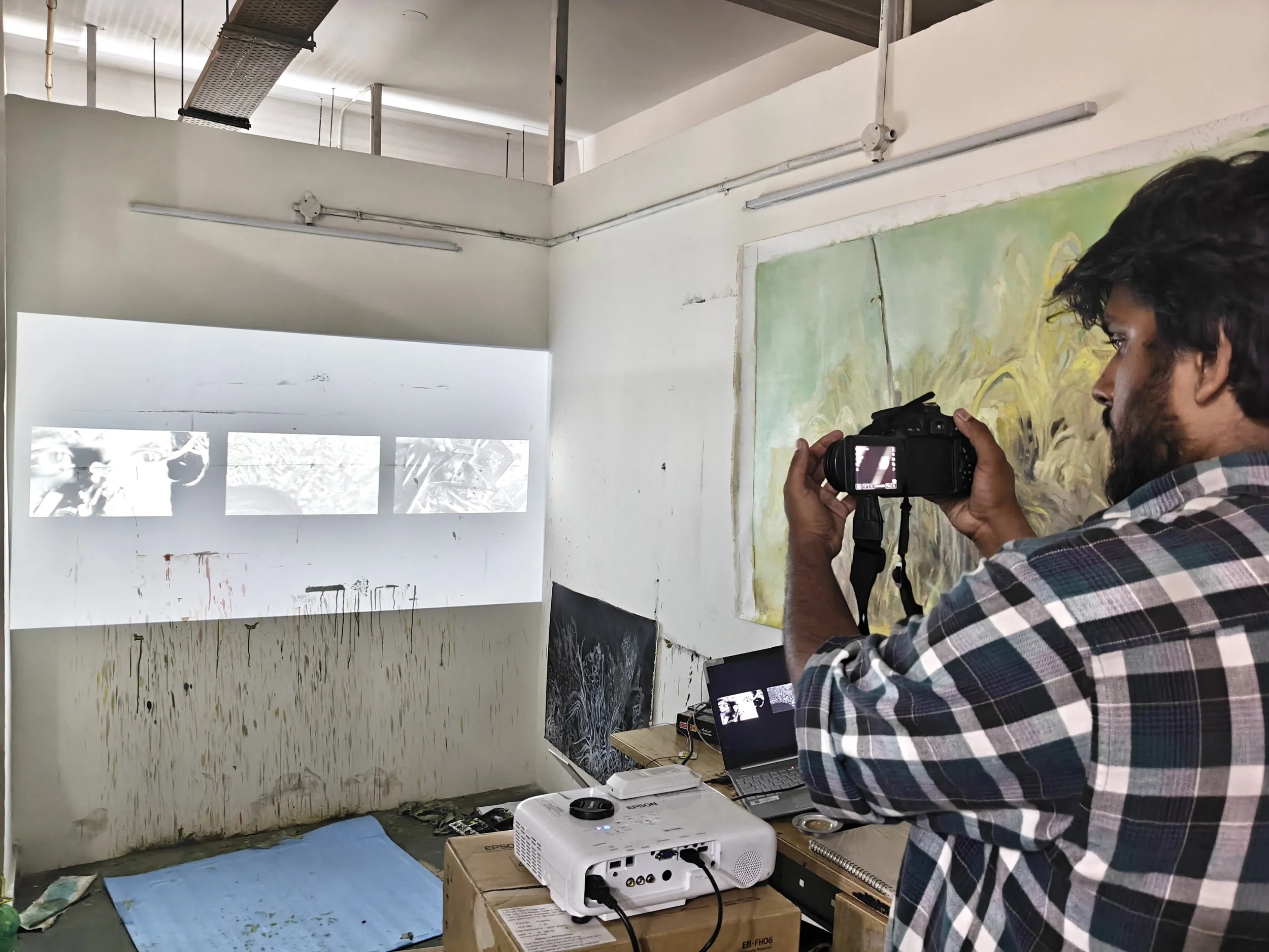 First-year MFA student Divyansh experimenting with moving images in his studio