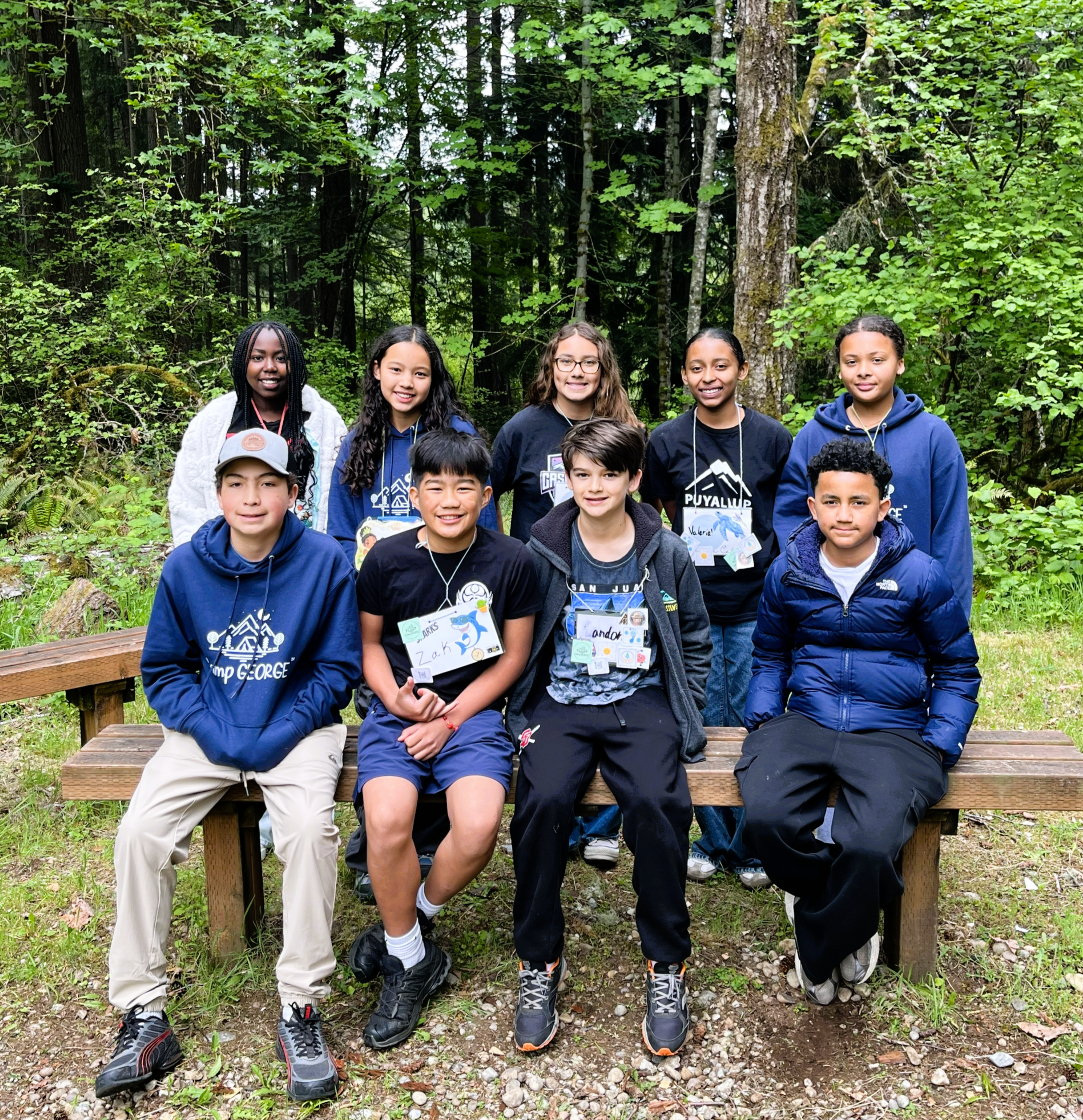african american girl studying pacific northwest plants trees ecosystems forest trails hiking