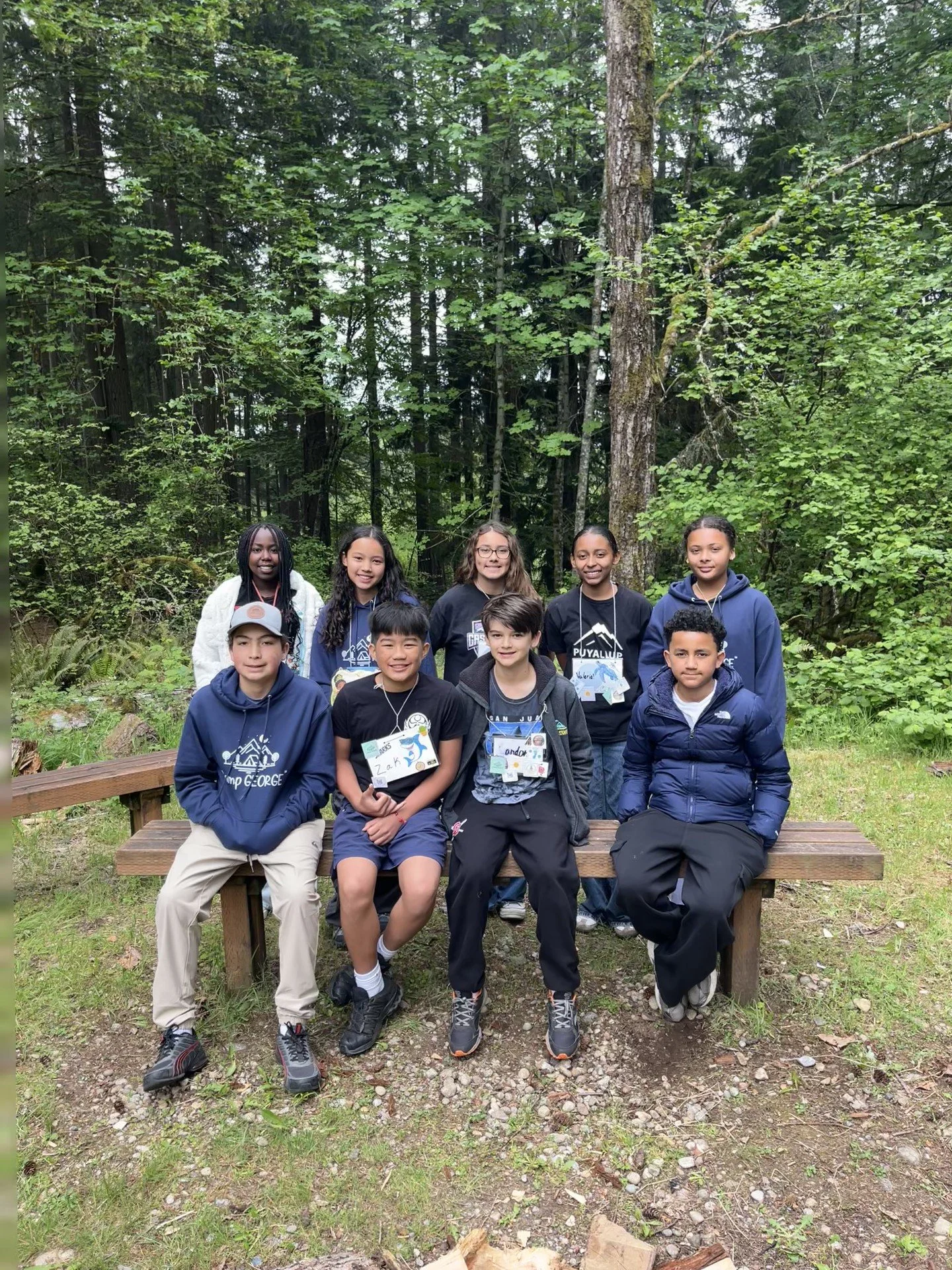 african american girl studying pacific northwest plants trees ecosystems forest trails hiking