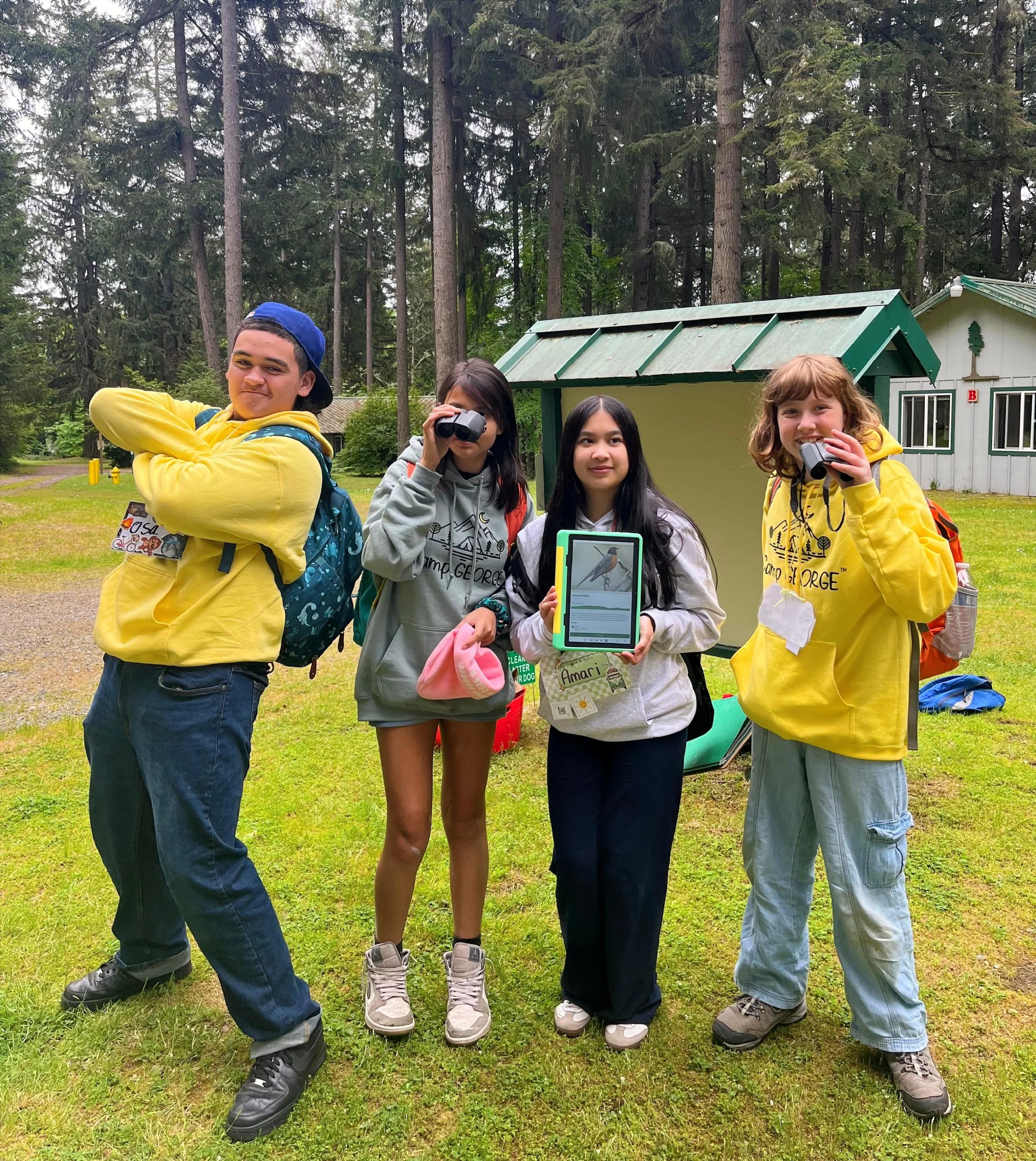 diverse students gardening composting outdoors nature school outdoor based learning soil study