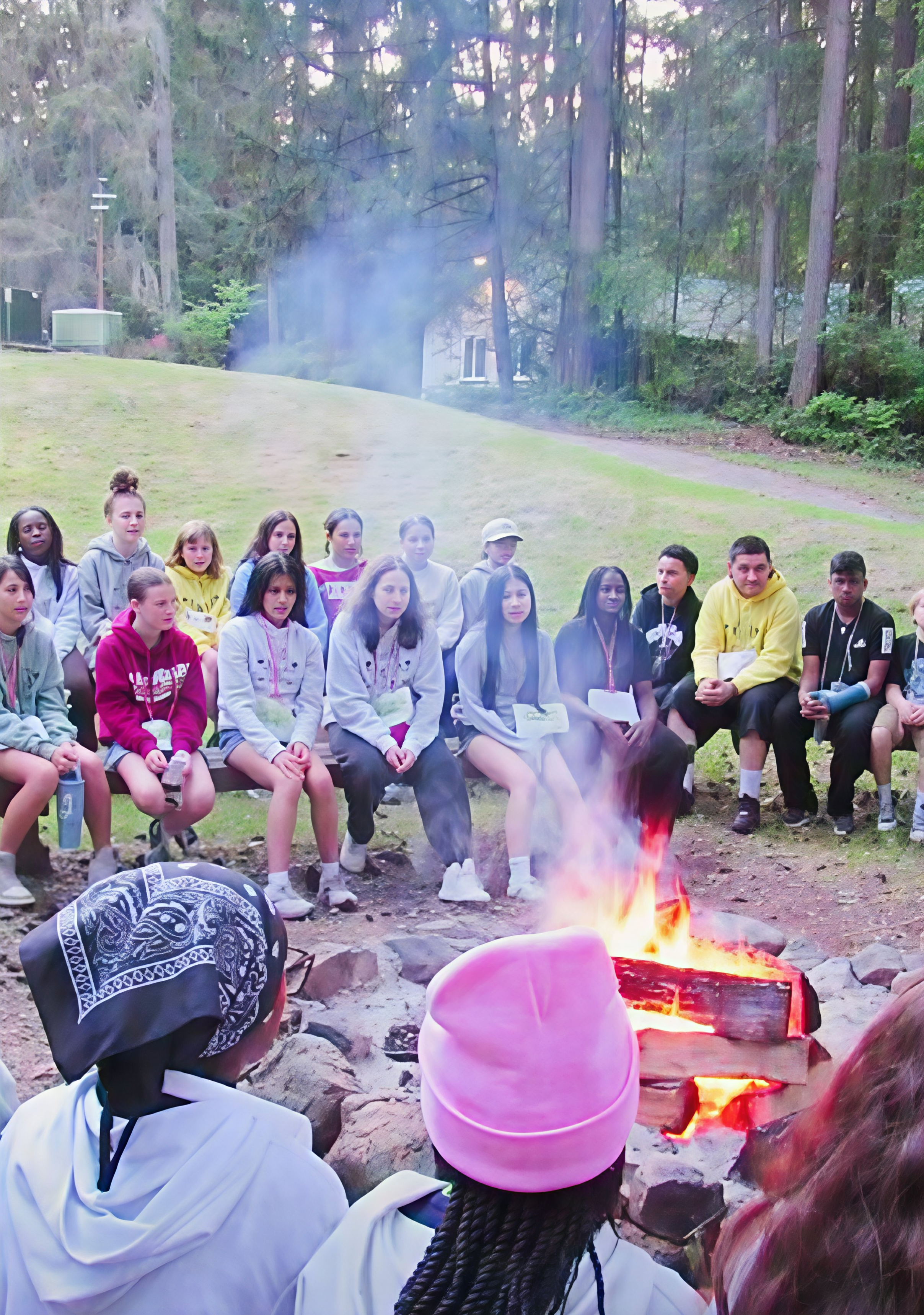 youth tween boy outside campfire traditions stories quiet songs candles touchstones community reflective meaningful social emotional learning development night