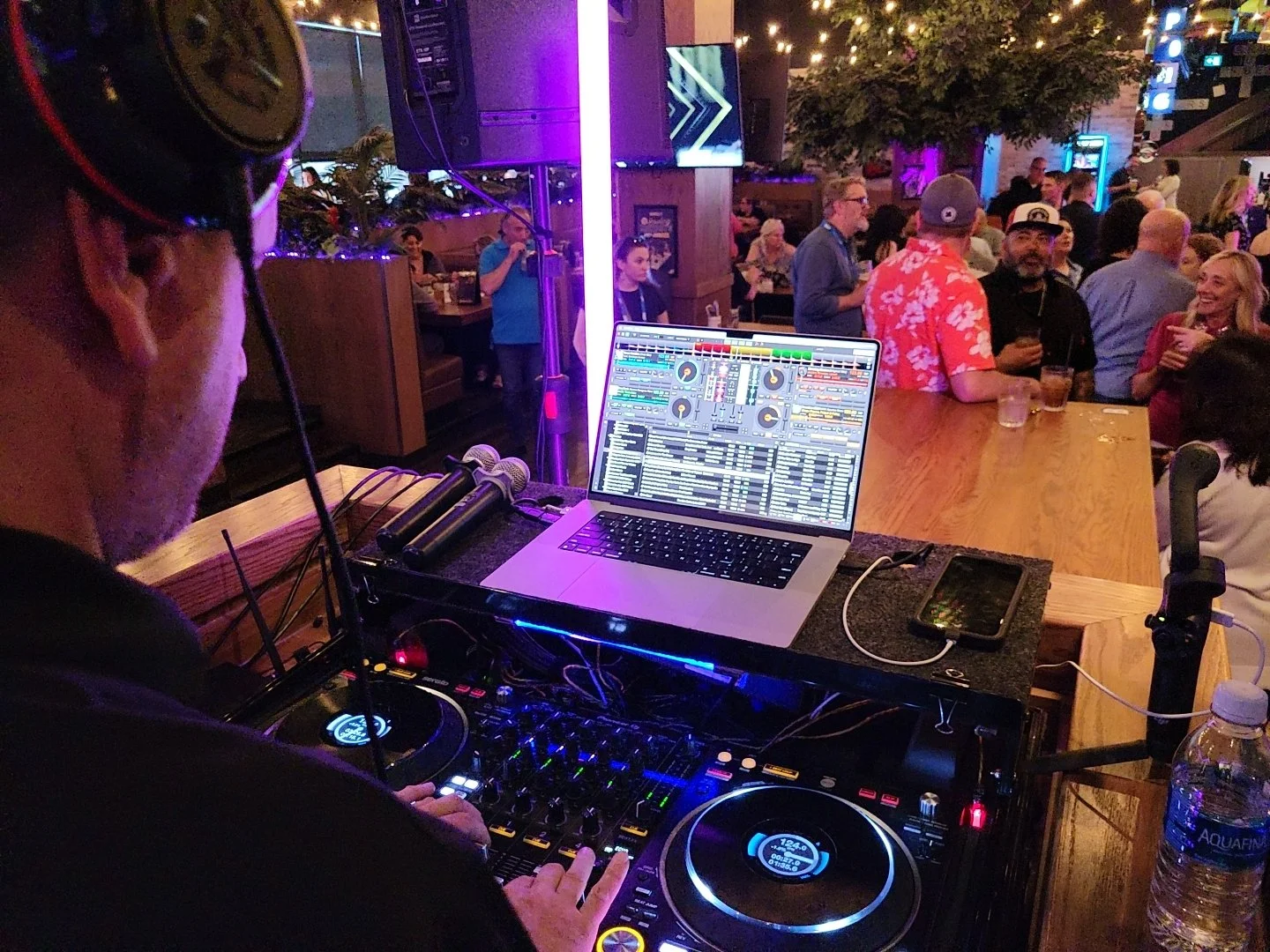 An exciting wedding dj on stage