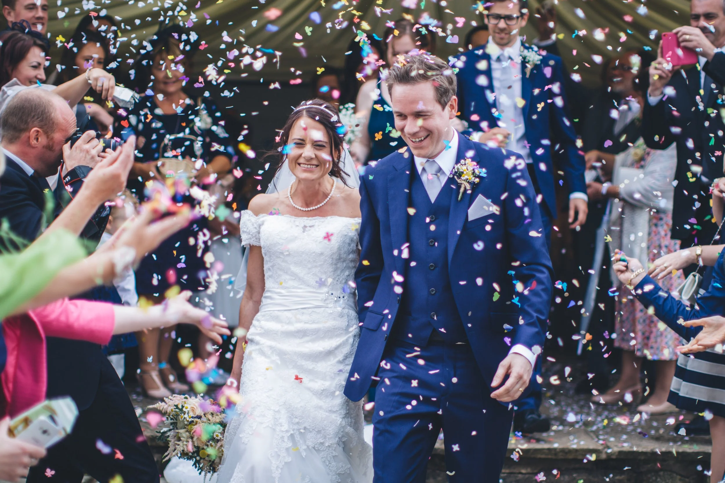 Bride and groom celebtraing their marquee wedding in macclesfield