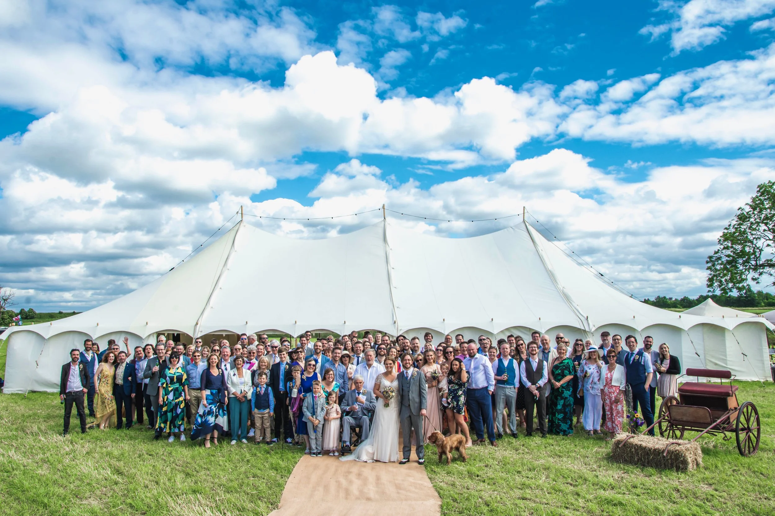 Lancashire marquee wedding event with all friends and family outside