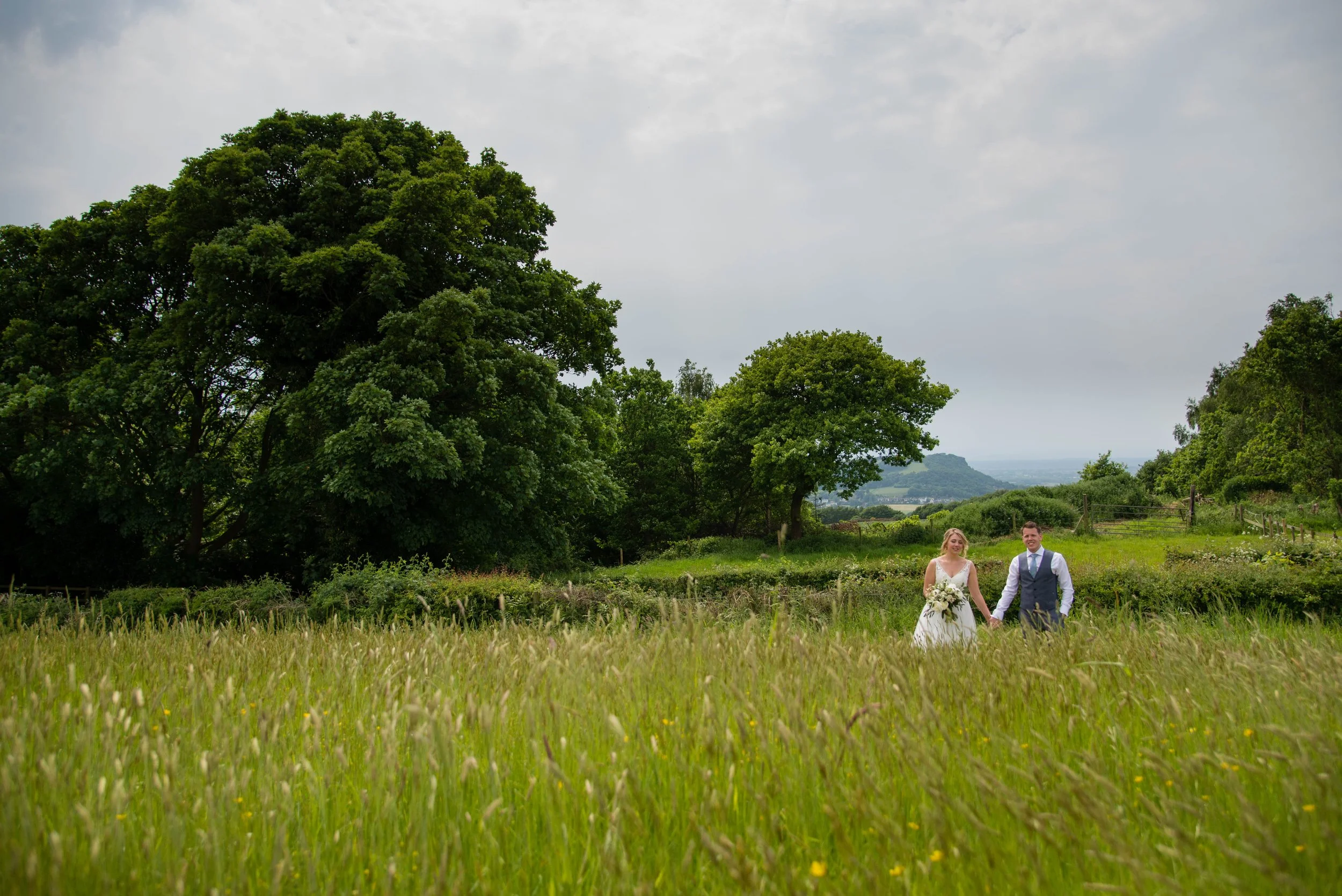Bride and groom in derbyshire wedding fields