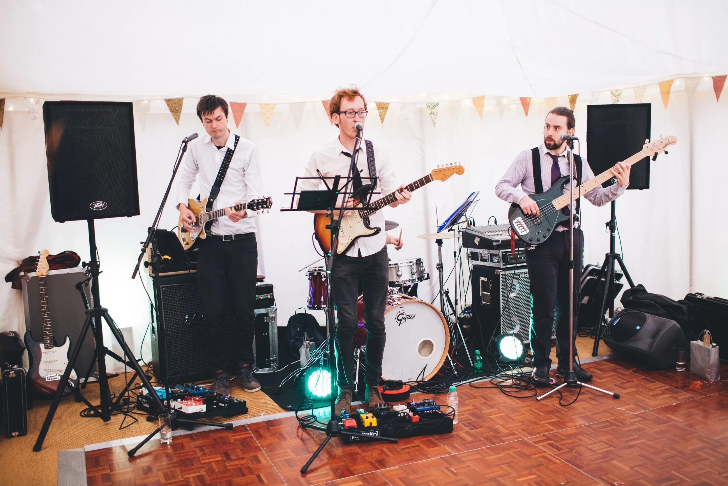 band playing in a 9 x 21 m marquee