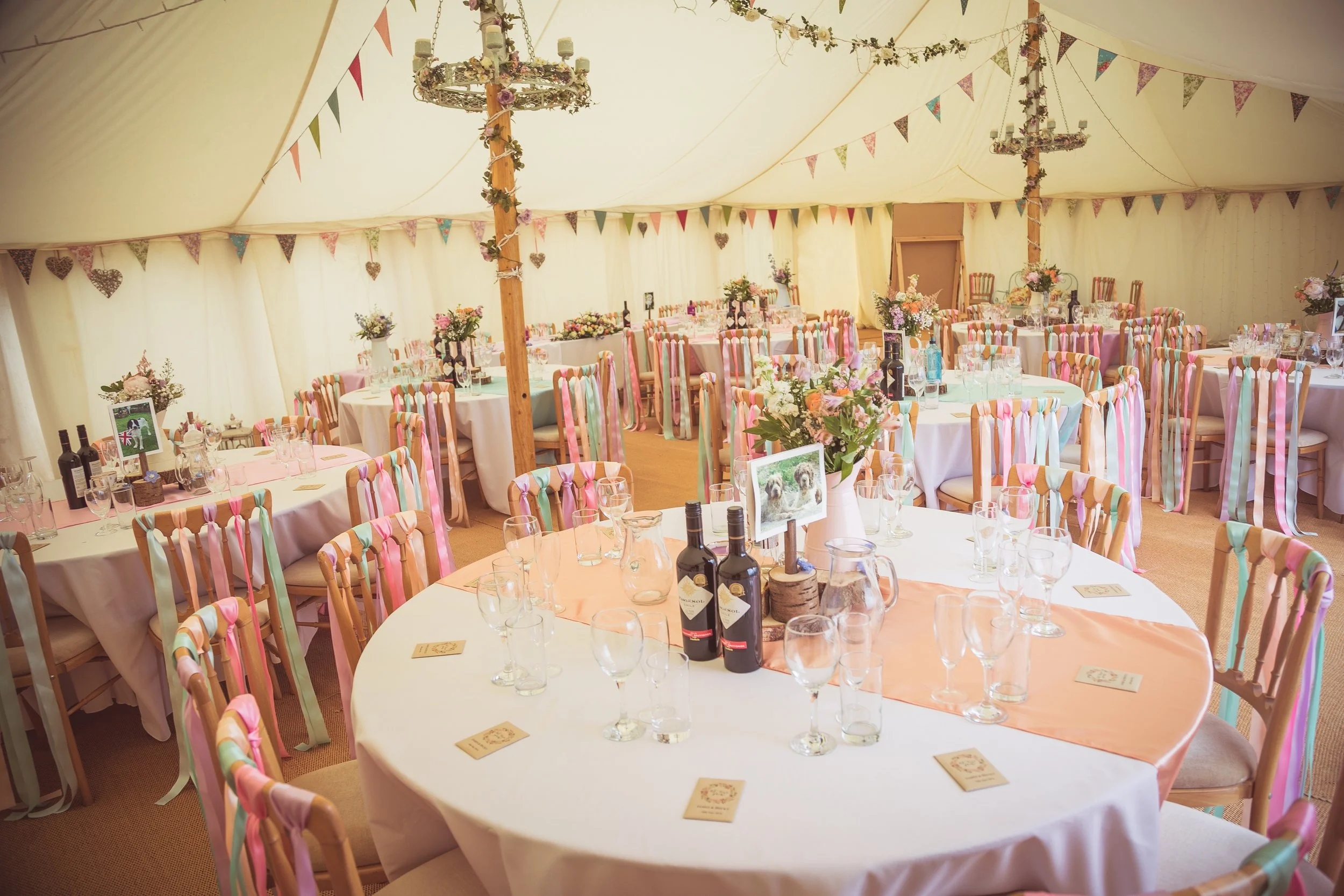 Round tables at a wedding venue marquee in cheshire