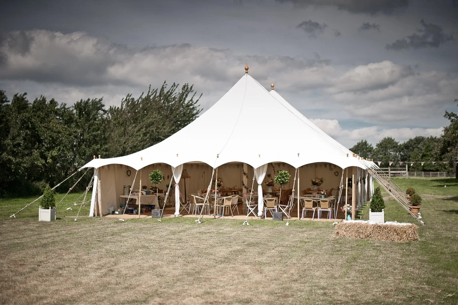 Small petal pole marquees with the walls off
