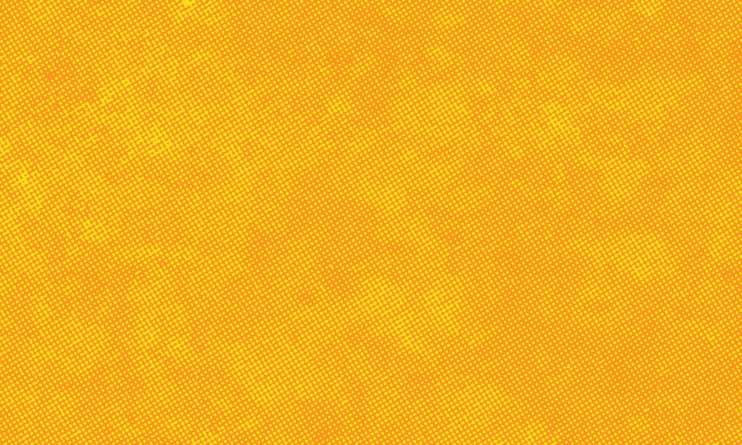 Abstract yellow and orange dotted pattern with diagonal orientation.
