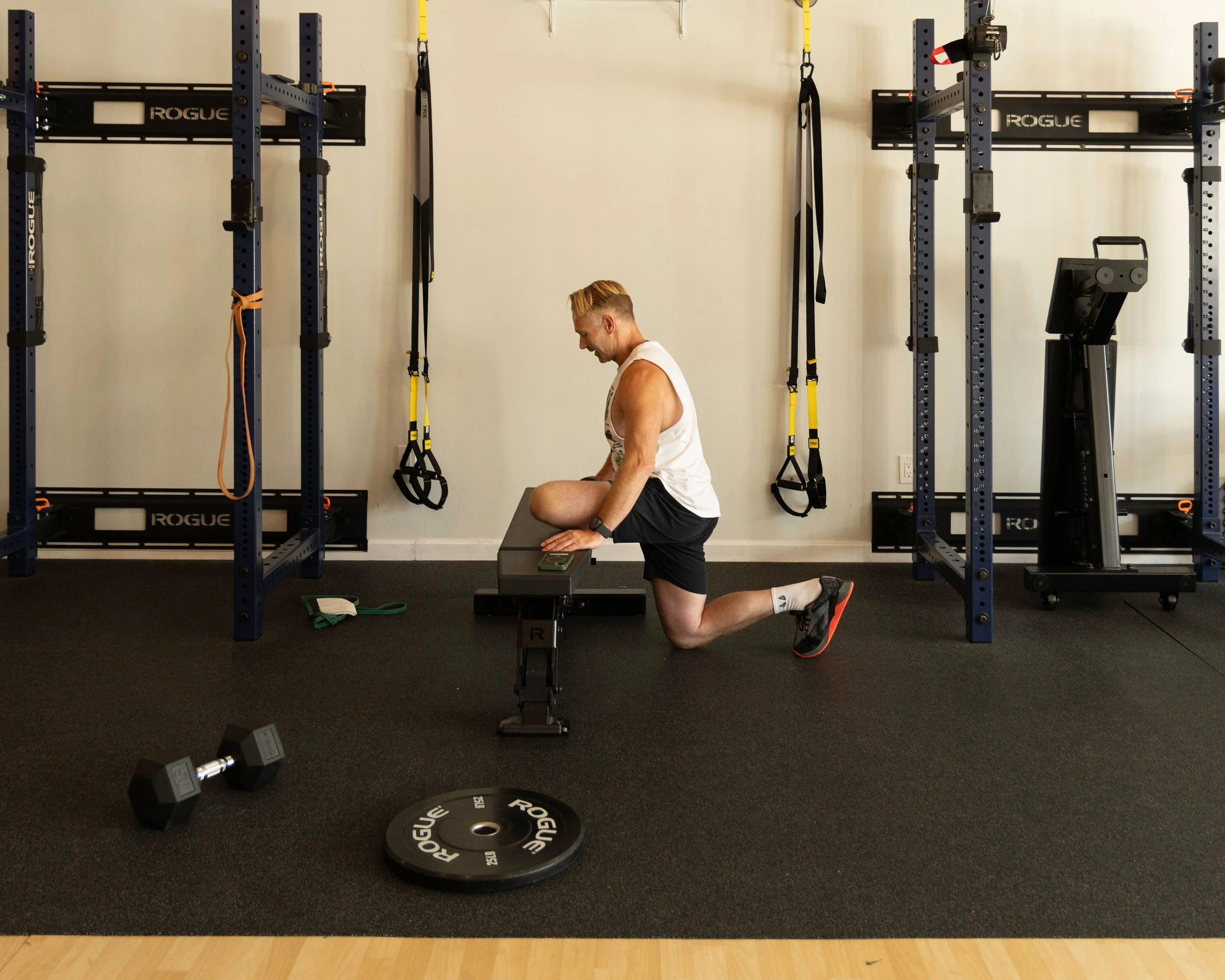 Client at The Genesis Fit in Marshfield MA doing flexibility and mobility training during 1-1 personal training session.