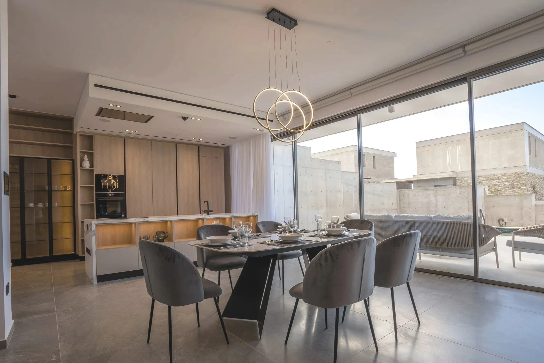Modern luxury villa interior photography Paphos - Real estate dining room Mediterranean view