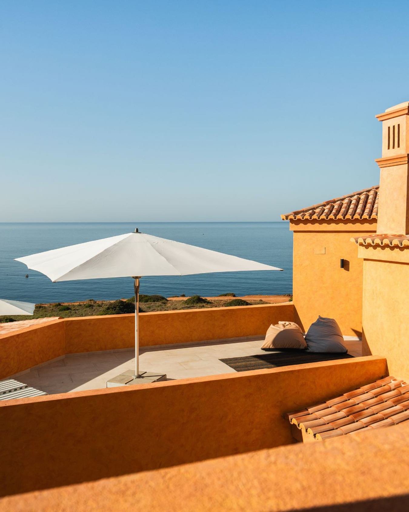 A sun-drenched terrace, the sea on the horizon and time for yourself this is where rest begins.

&mdash;

Um terra&ccedil;o banhado a sol, mar no horizonte e tempo para si, o descanso come&ccedil;a aqui.
.
.
.
#casapordosal #visitalgarve #portugal