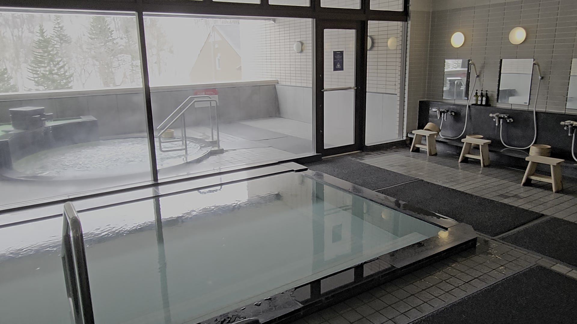 Indoor onsen and outdoor rotenburo bath at Club Med Kiroro Peak, Hokkaido