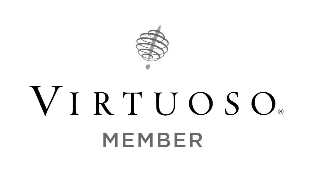 Logo of Virtuoso with a stylized globe and the text 'Virtuoso Member'.