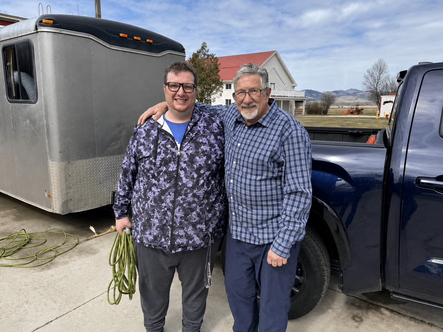 Dakota and Tim Doerr beside the T&S Mobile Hearing Express mobile testing unit