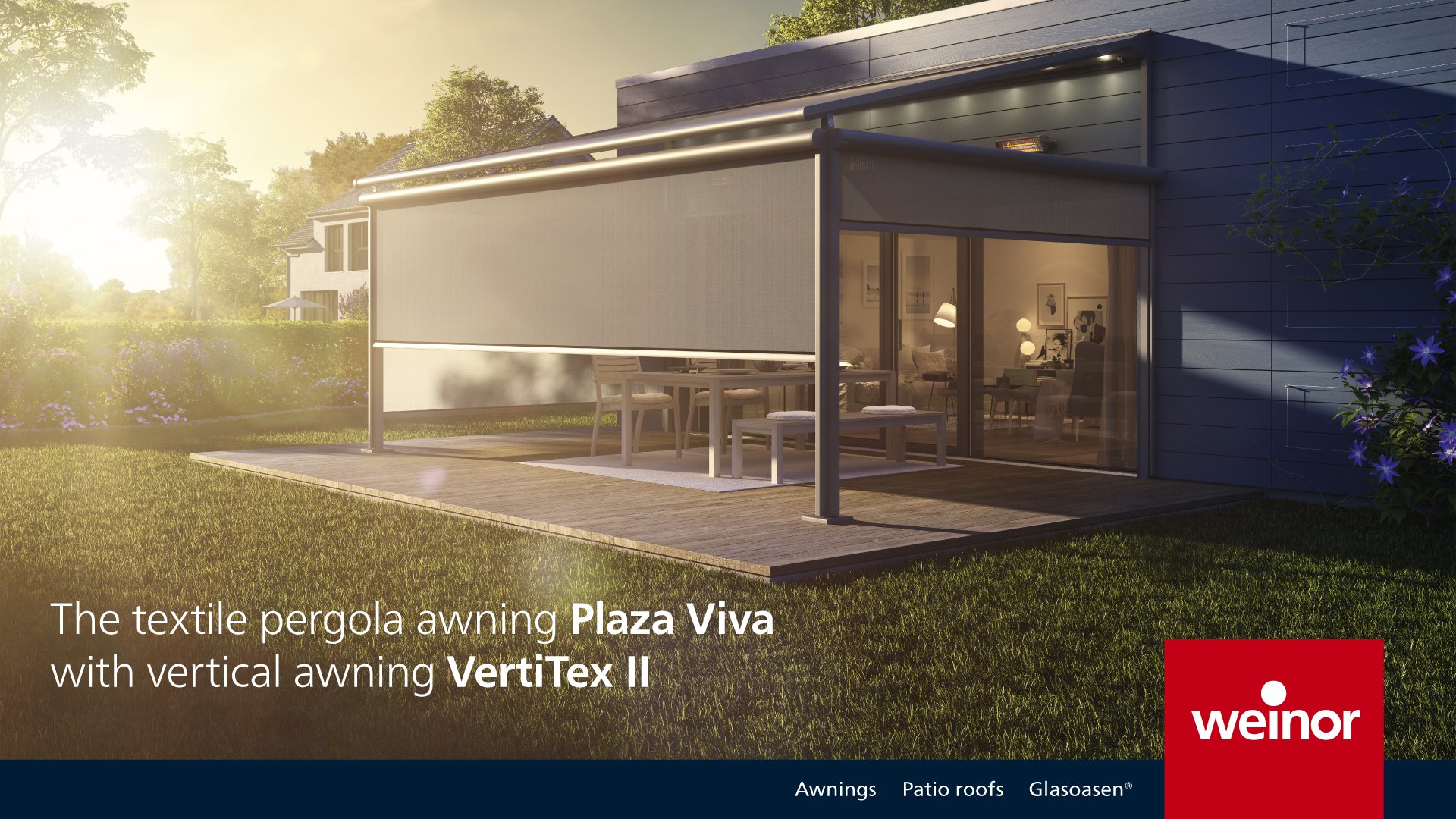 A modern house with a textile pergola awning called Plaza Viva with vertical awning VertiTex II, set on a wooden deck in a grassy yard with trees and neighboring houses in the background at sunset.