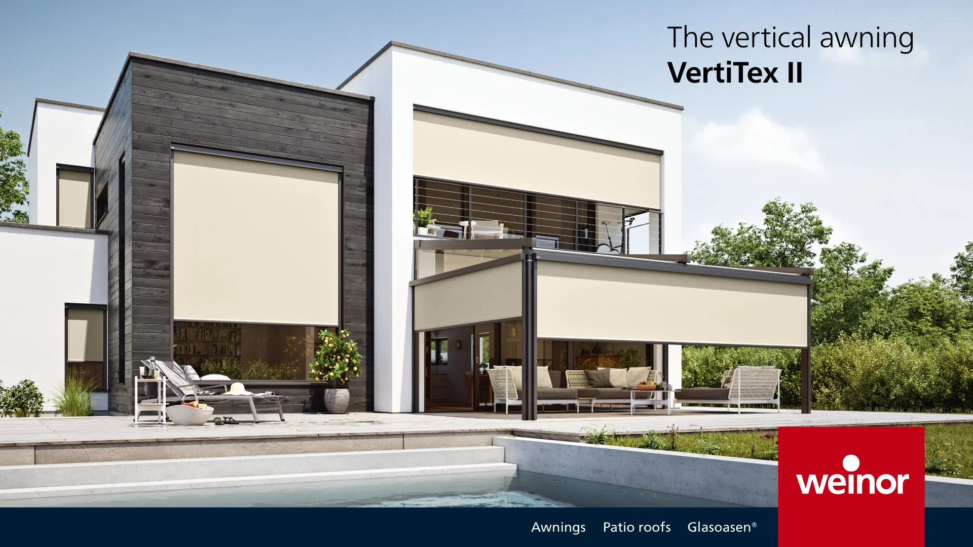 Modern house with white and black exterior, featuring vertical awning VetiTex II, patio furniture, and a swimming pool in the foreground, surrounded by trees.