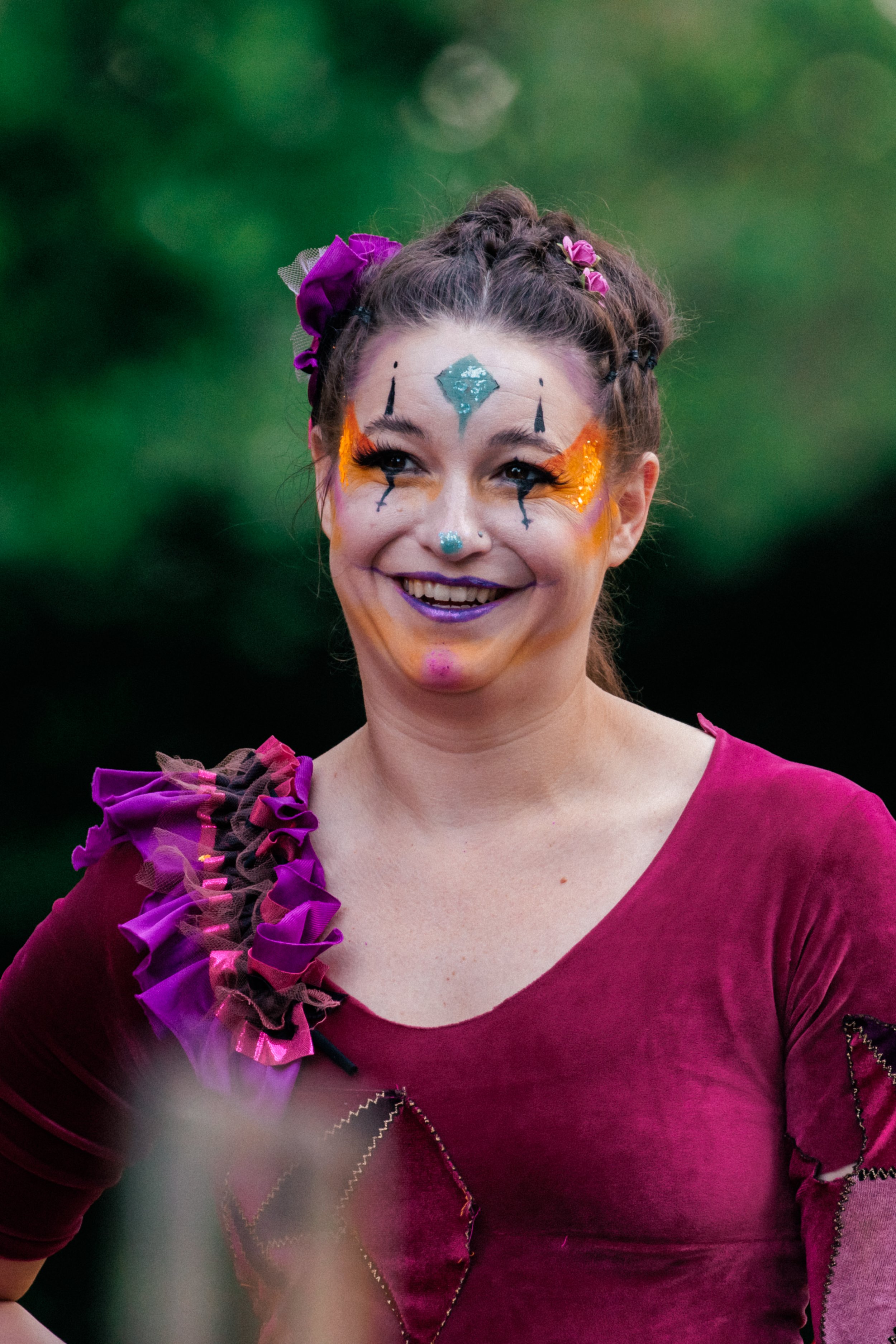 Headshot of Kenzie in full costume and makeup before show.