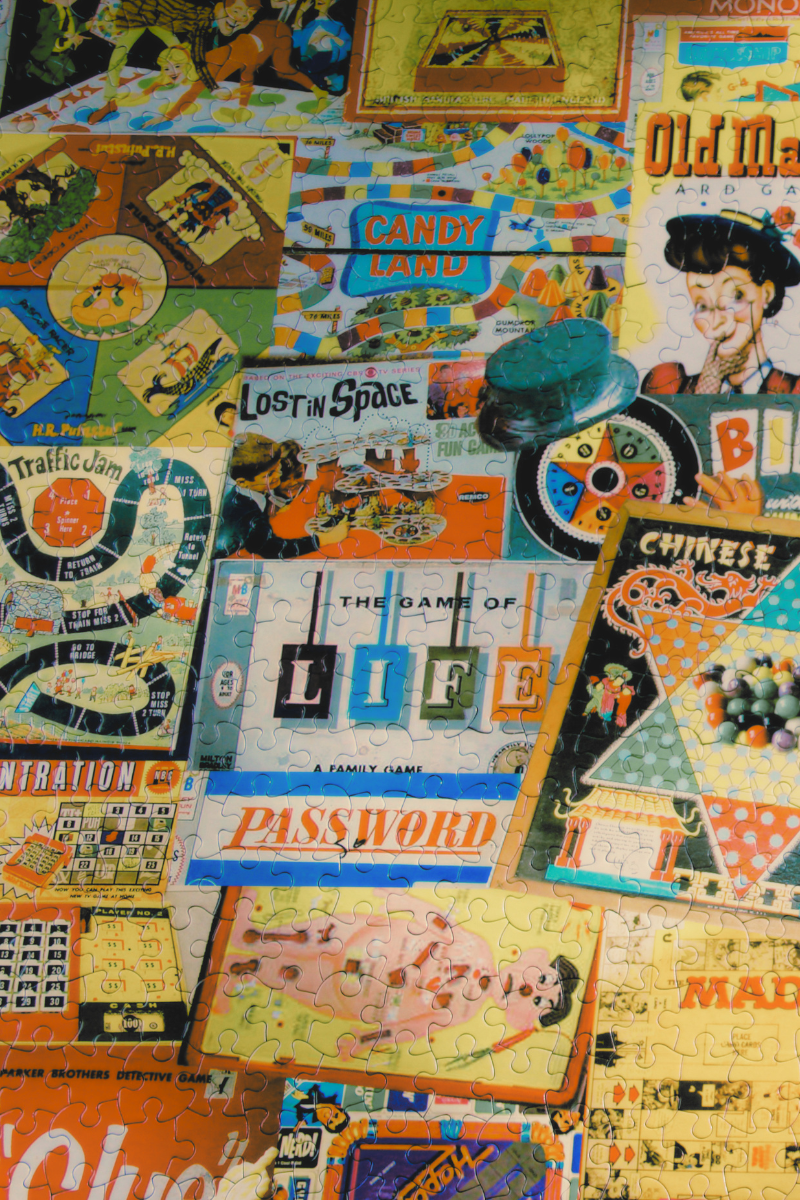 A collection of puzzles with images of vintage games like Life, Old Maid, Operation, and Chutes and Ladders.
