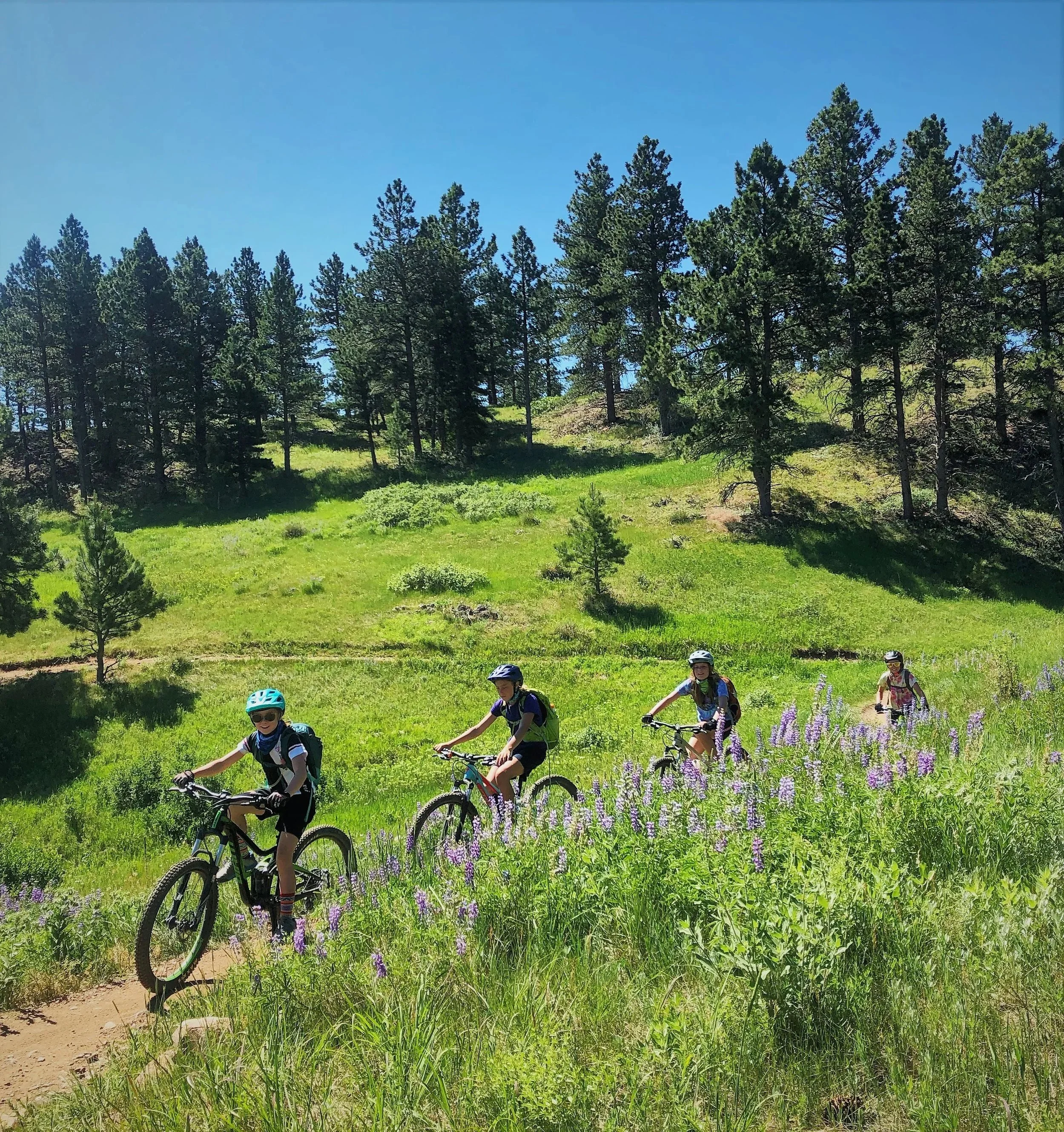 Best bike teams near me youth mountain bike team bike club boulder CO best bike team for kids Dowbhill mtb and race support SMBA Singletrack Mountain Bike Adventures