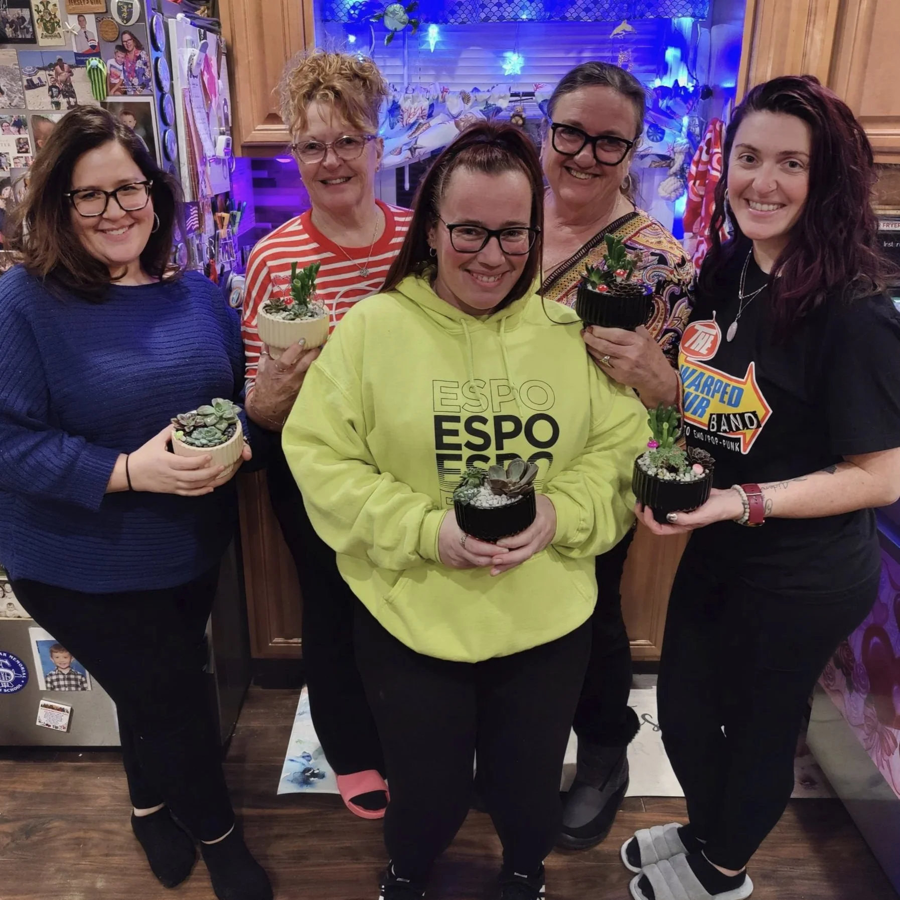 5 Women holding succulent creations