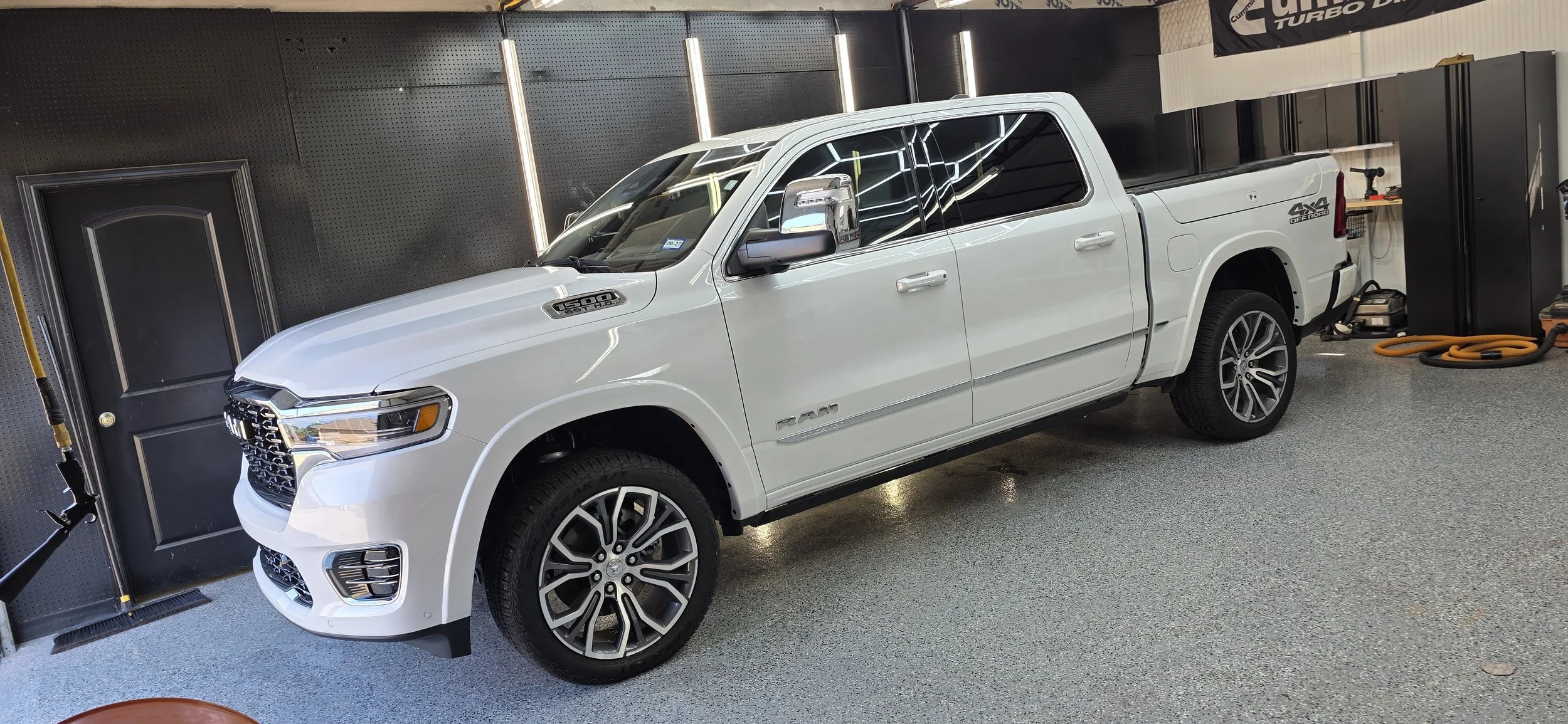 White Ram 1500 Tungsten in for maintenance detail at Superior Coatings Texas in Burleson, Texas 