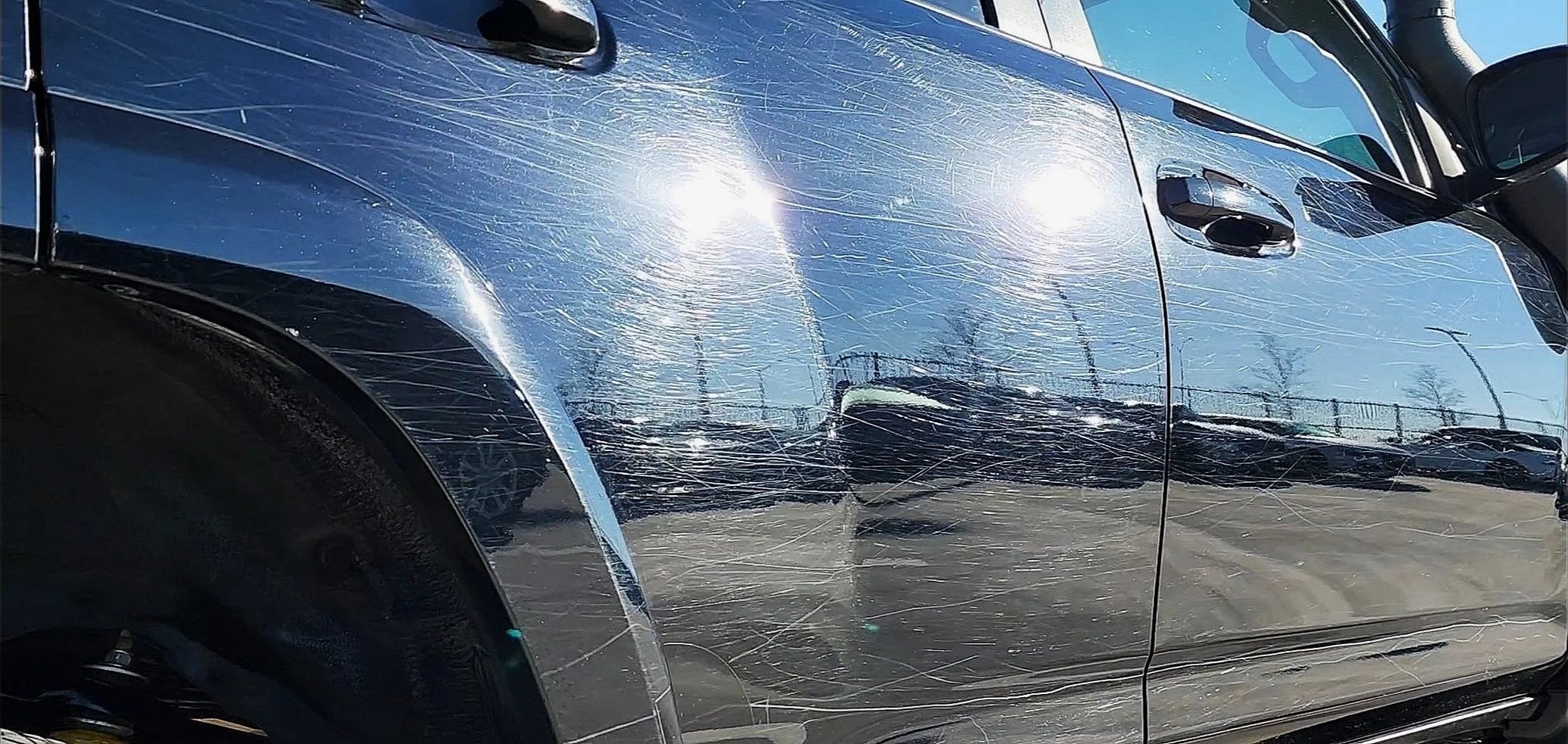 Black 4Runner heavy scratches before paint correction in Burleson, TX