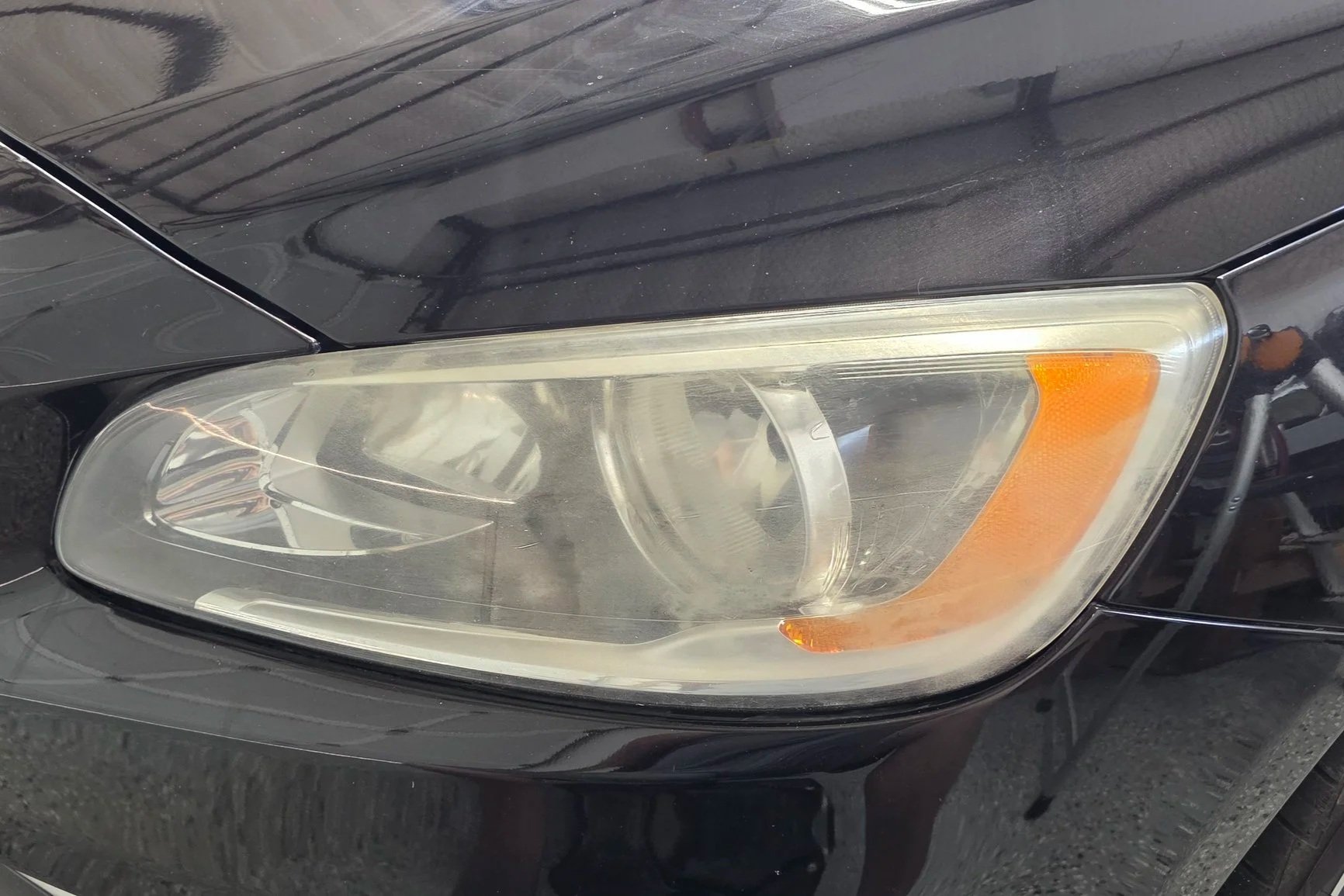 Volvo S60 oxidized headlight before