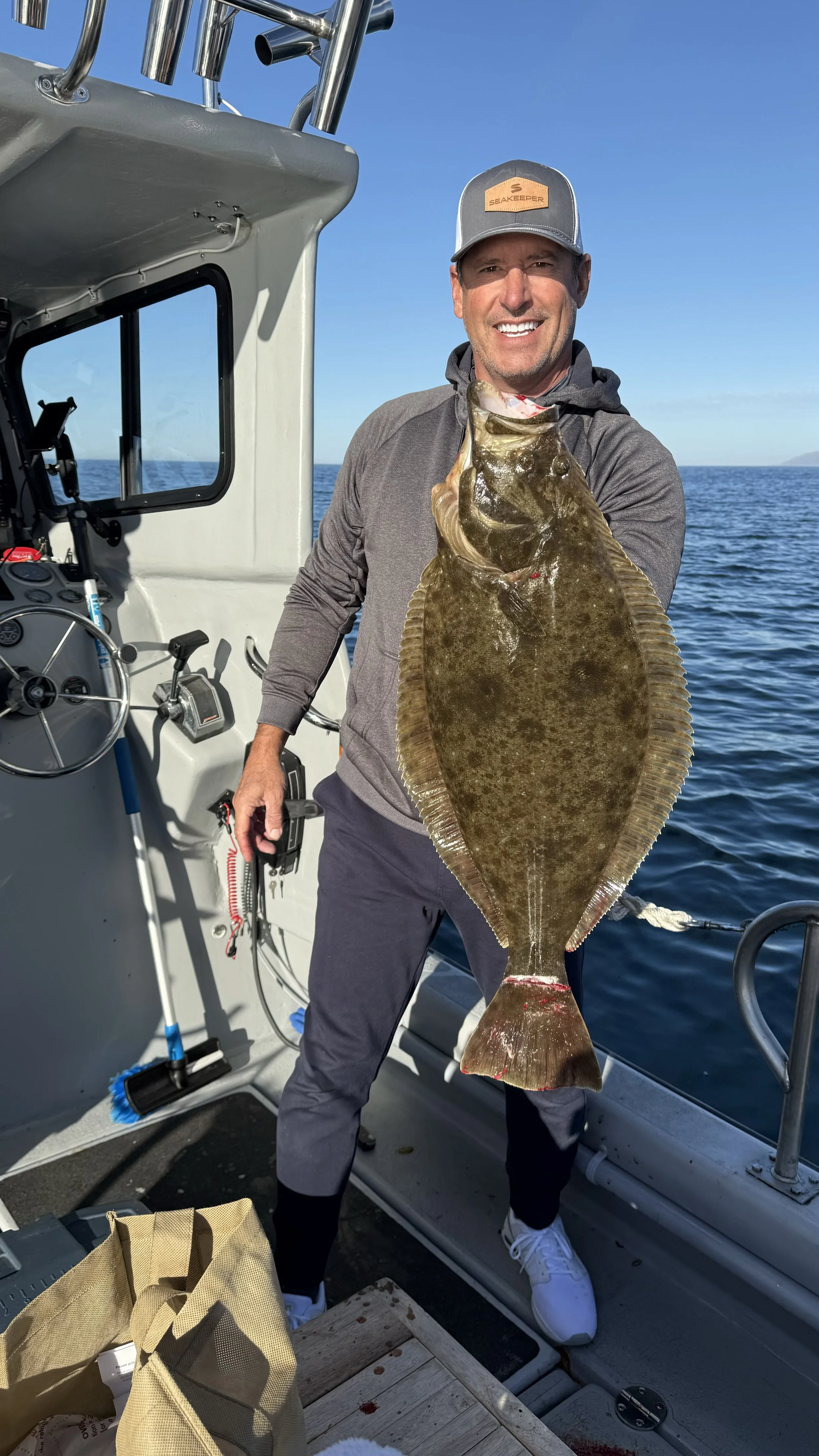 Peter Miller of "Uncharted Waters" with a nice halibut caught on the Sunny Day out of Port San Luis