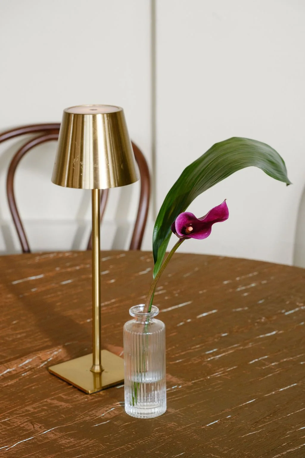 New Orleans wedding florals and plant rentals. Cascading greenery centerpieces with soft seasonal blooms.