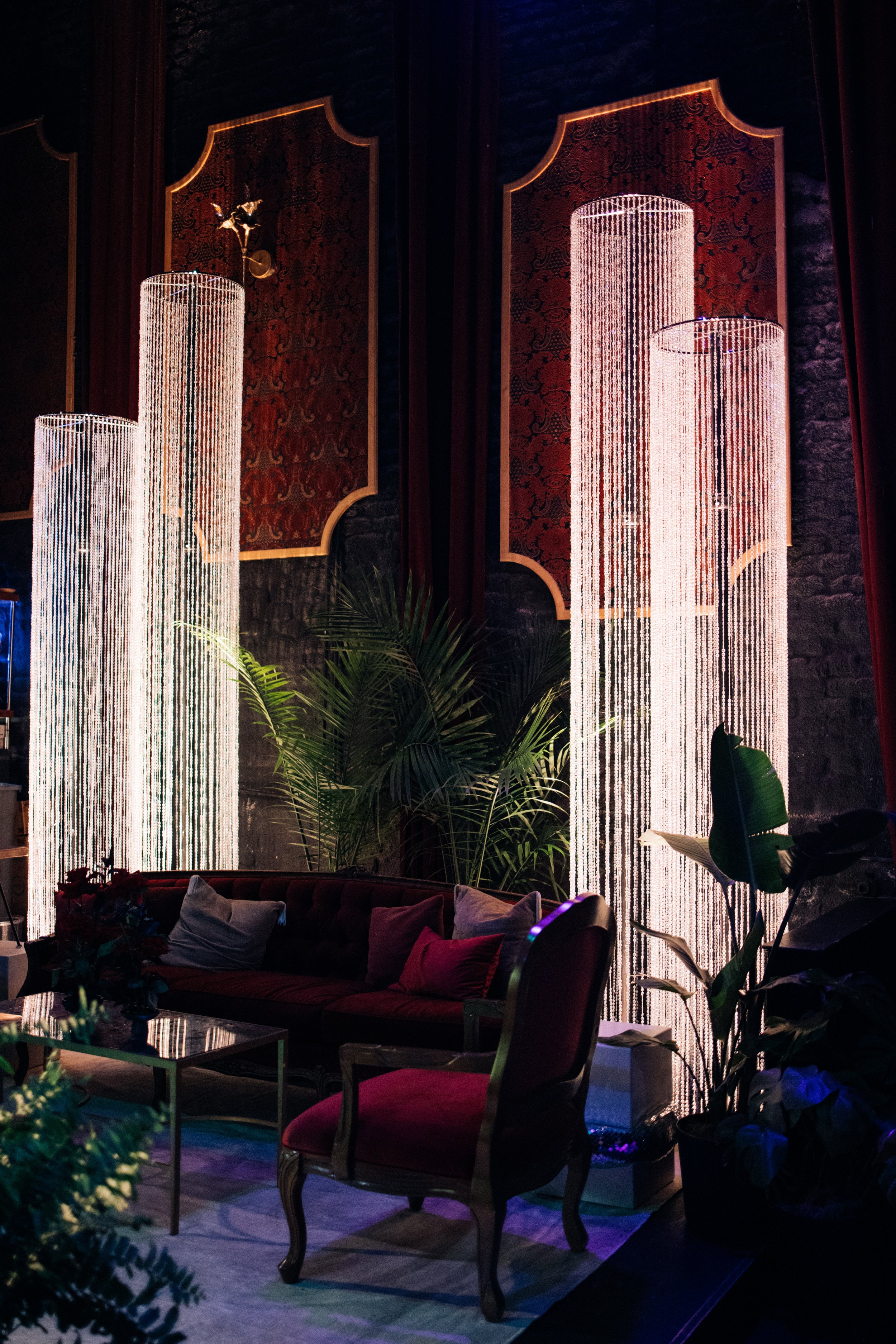 Lush tropical greenery styled for an intimate private event.