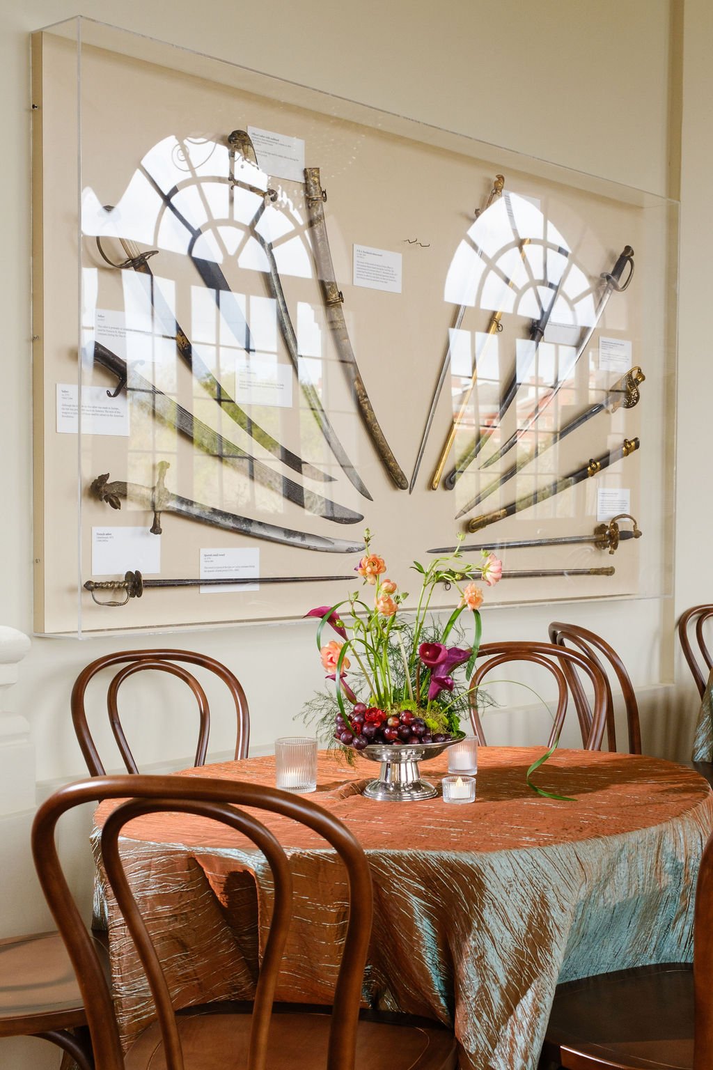 Greenery forward centerpiece with seasonal florals New Orleans plant rentals and Floral