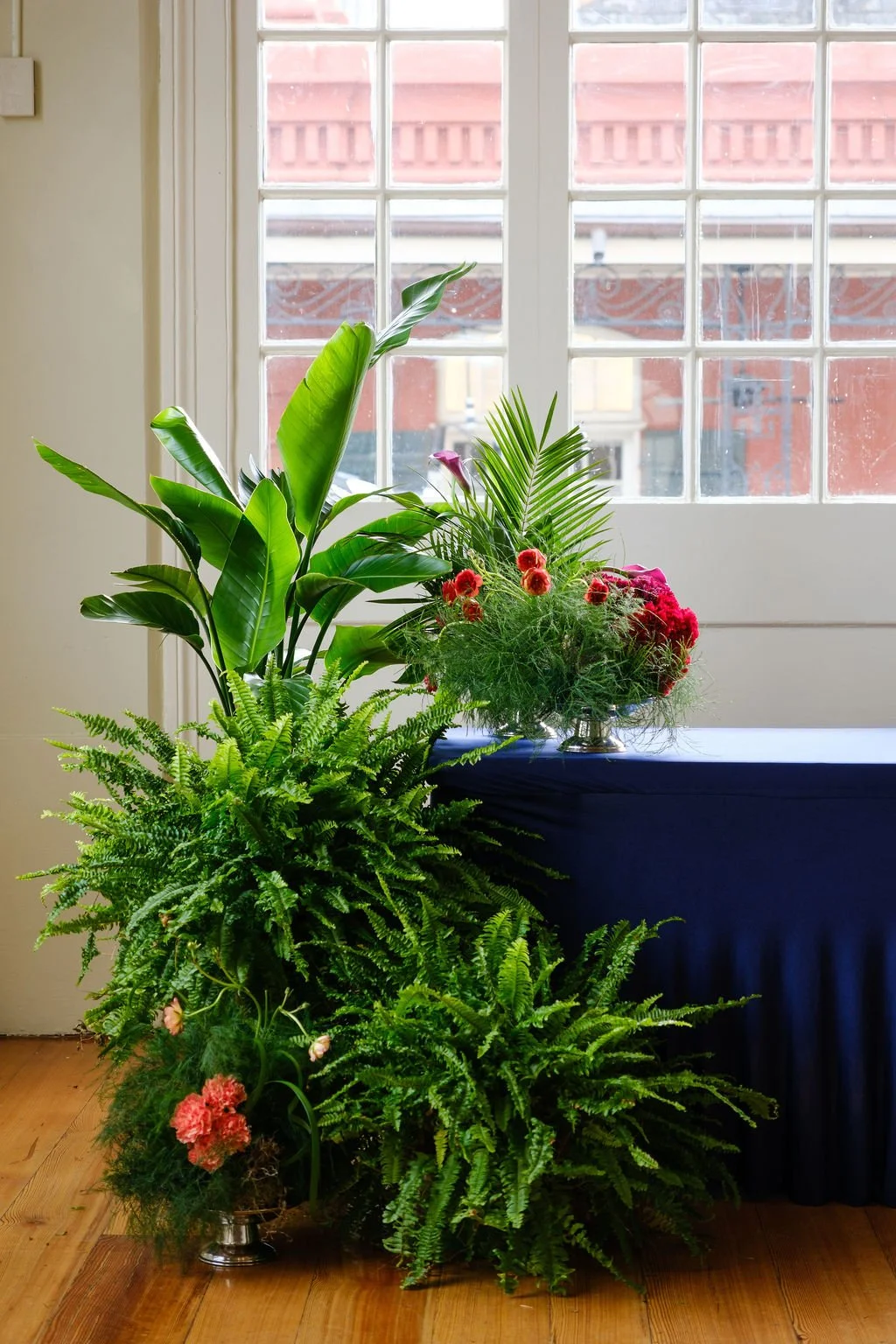New Orleans corporate event florals and indoor plant rentals. Biophilic greenery displays with elevated floral touches.
