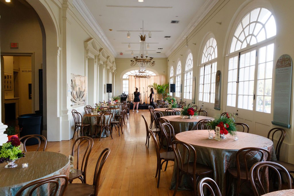 New Orleans corporate florals and event plant rentals. Modern greenery-forward centerpieces with curated floral elements.