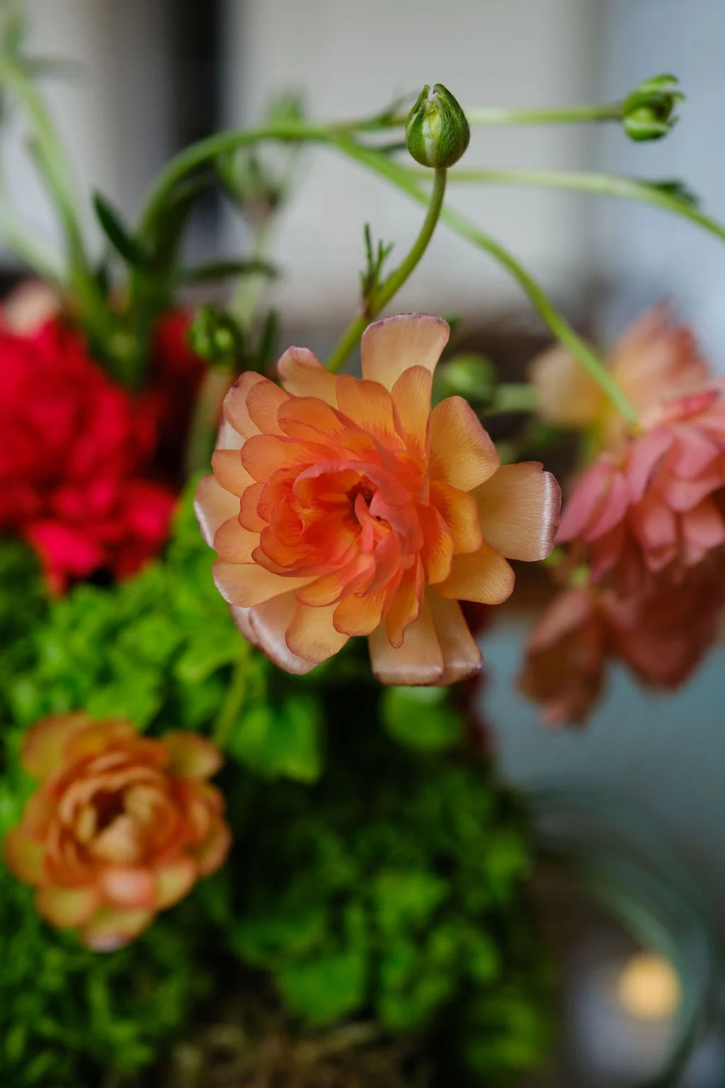 Greenery forward centerpiece with seasonal florals New Orleans plant rentals and Floral
