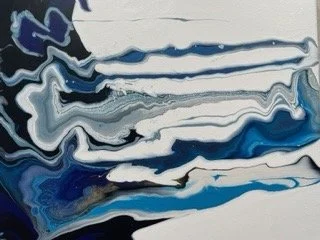 Abstract painting with blue, white, and black swirls
