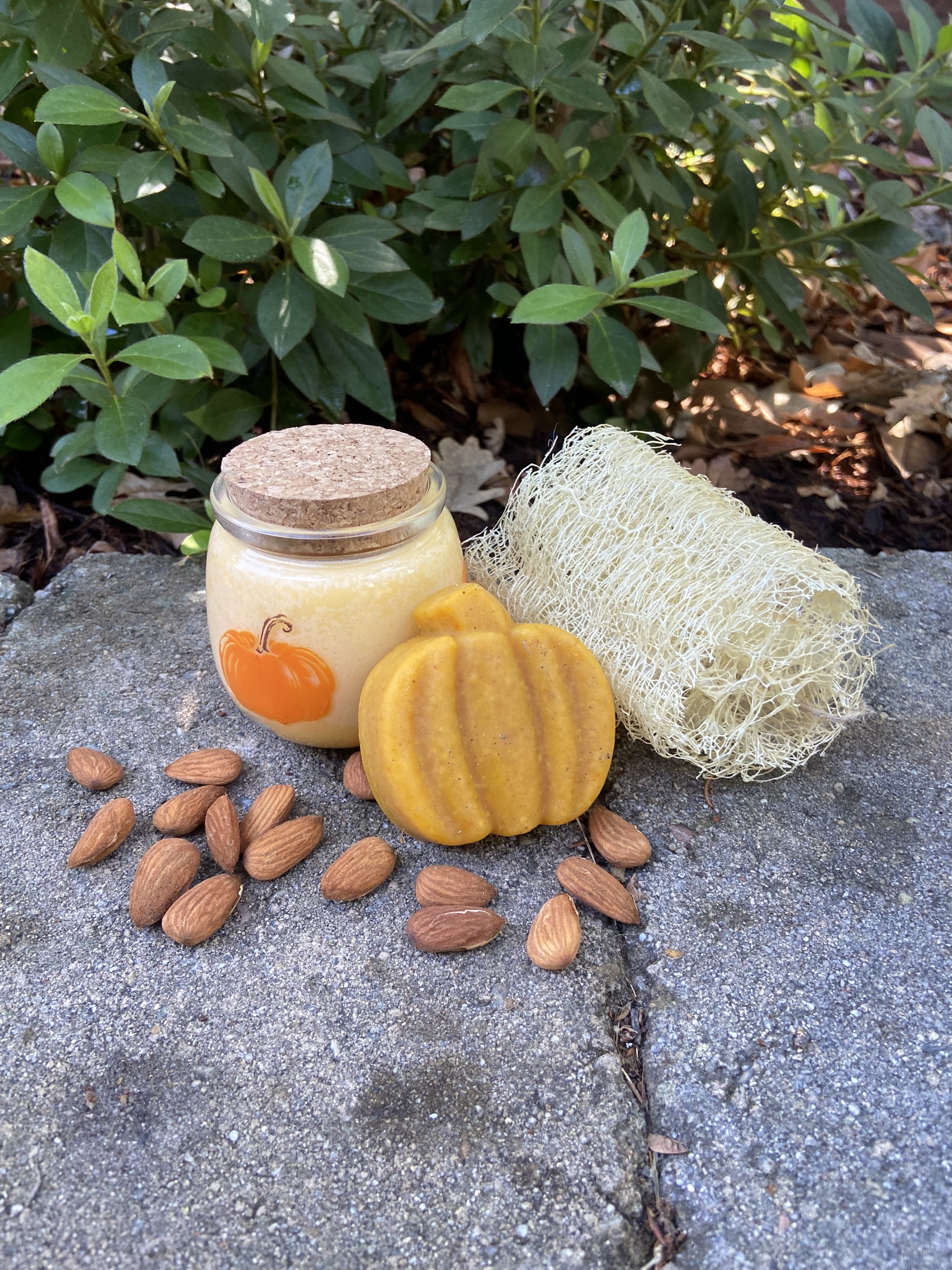 pumpkin spice candle and orange pumpkin soap