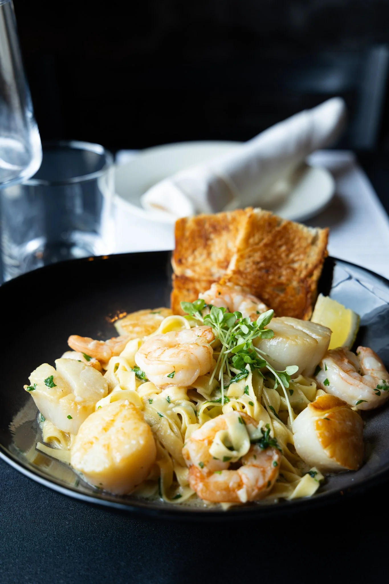 scampi dish with fresh pasta, scallops, shrimp