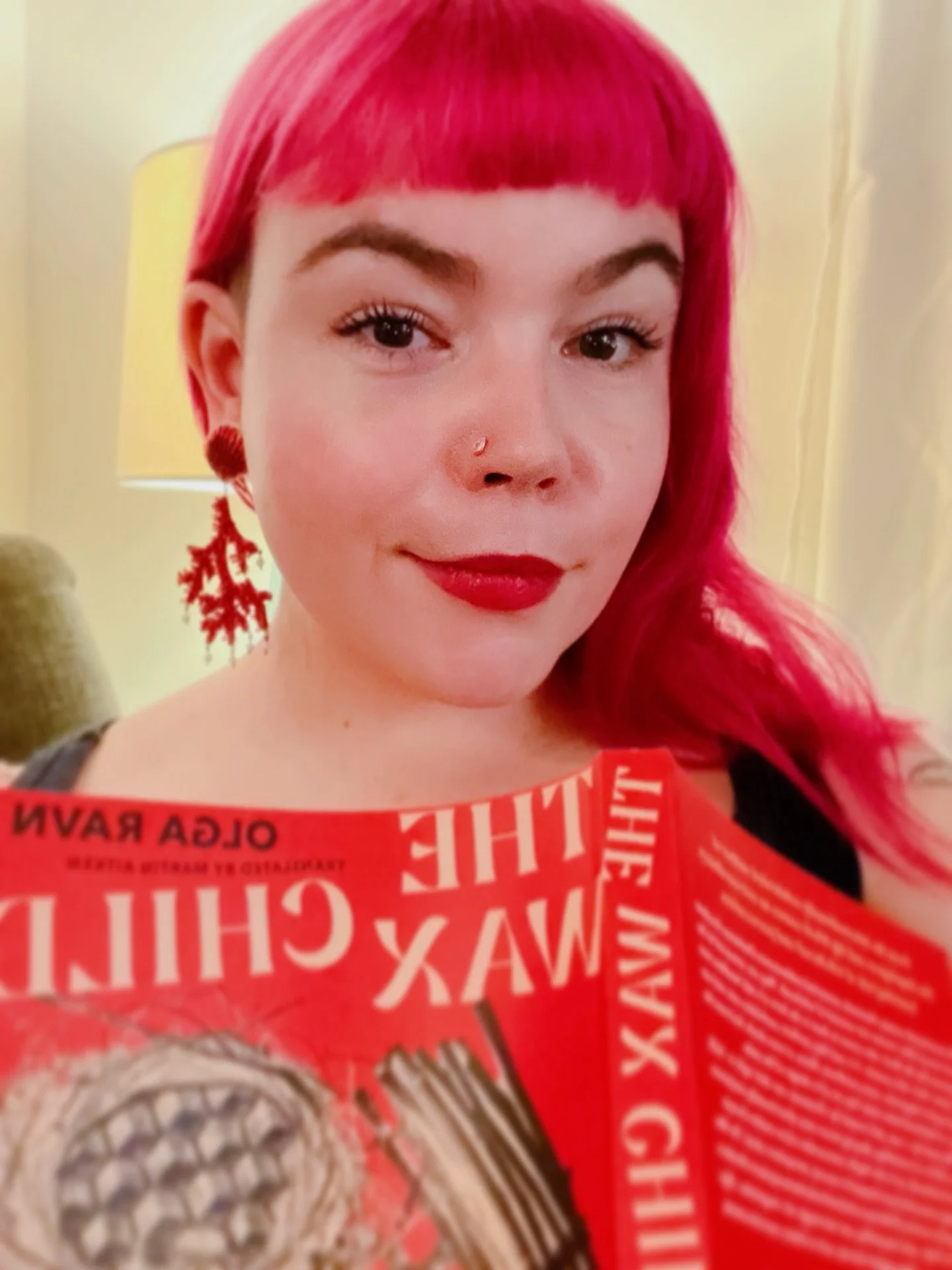 Merry Christmas! I got these mermaid-y earrings and The Wax Child by Olga Ravn (@bookhugpress). And a tamagotchi oh no I left the tamagotchi at home I hope it&rsquo;s still alive