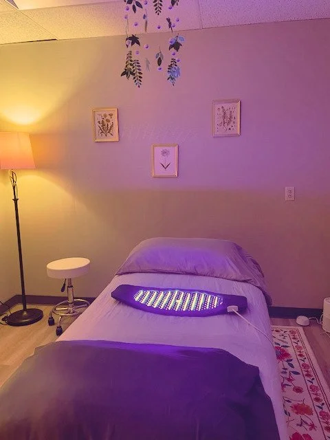Image of a calm treatment room at Louisville Family Acupuncture with soft lighting and a peaceful atmosphere
