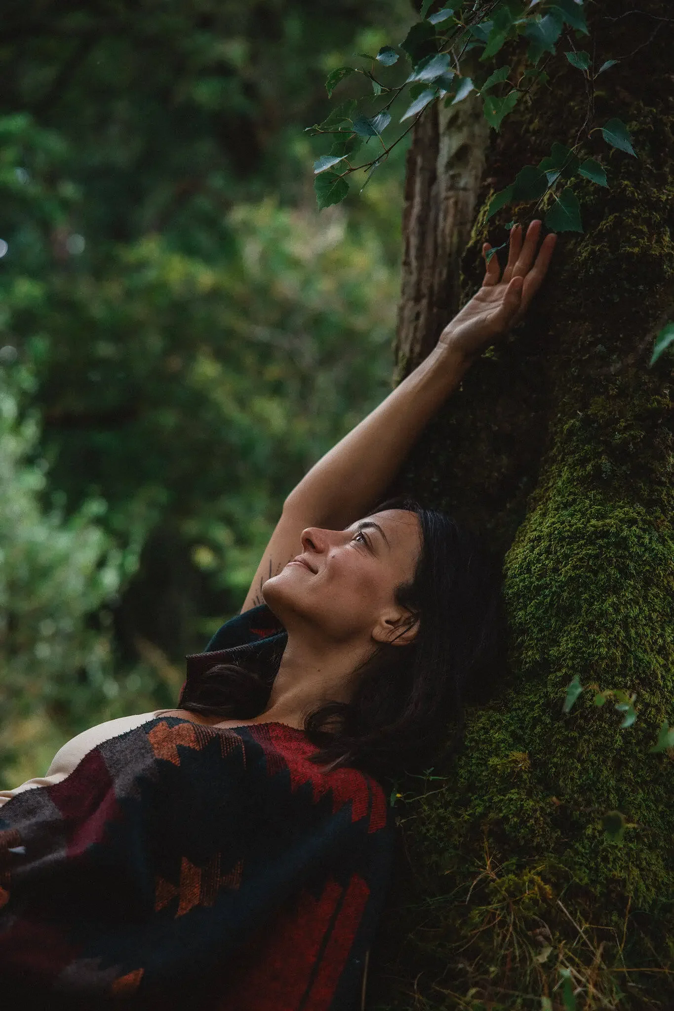 Lara Wehbe laying on a tree