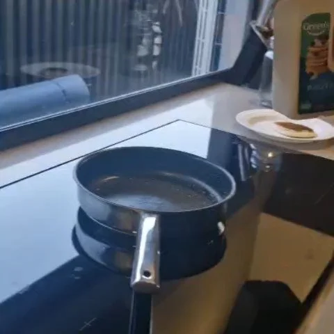 Paul and Craig cooking breakfast