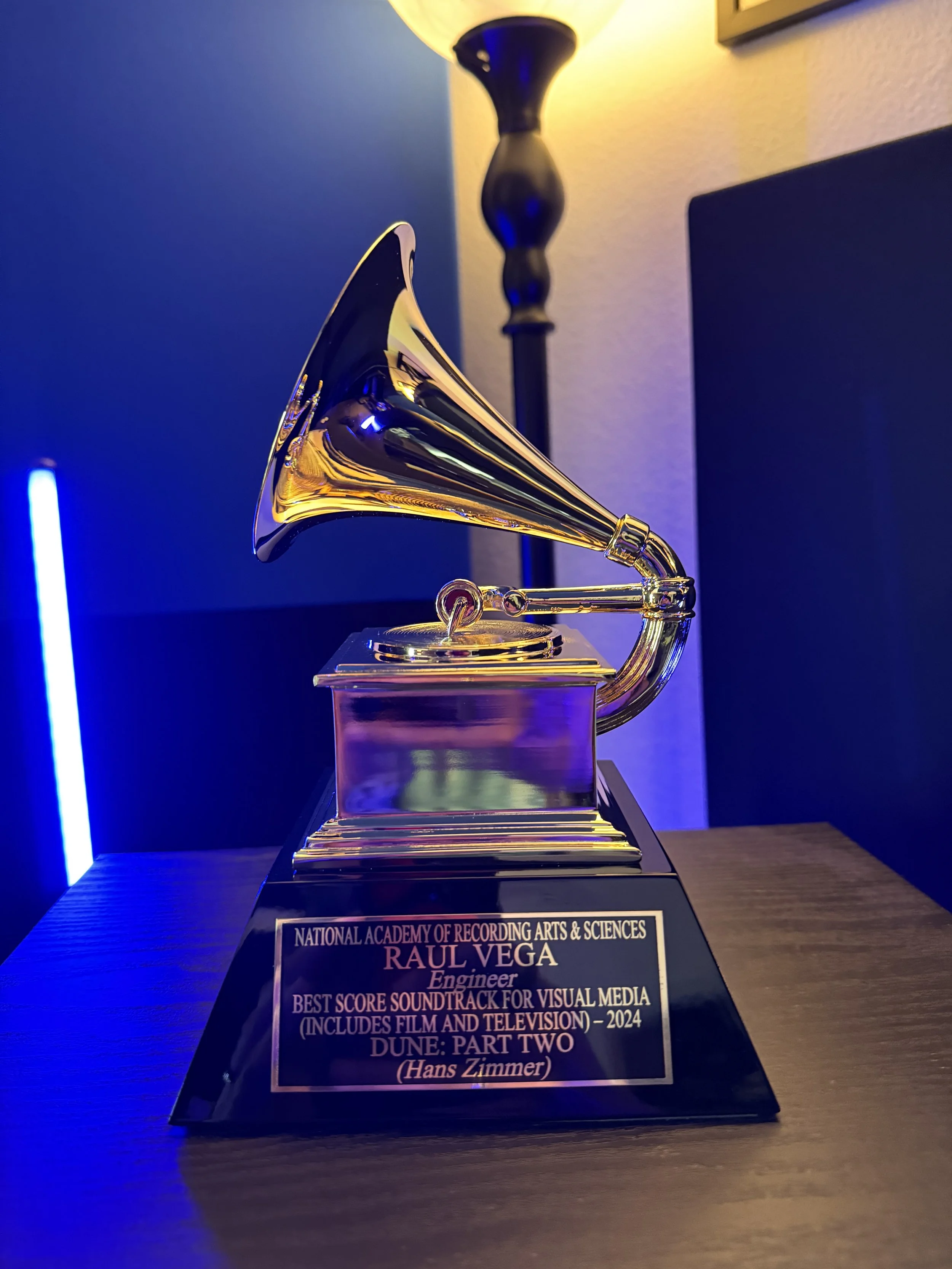 A Grammy statutte that reads: National Academy of Recording Arts & Sciences, RAUL VEGA, Engineer, Best Score Soundtrack for Visual Media (Includes Film and Television) - 2024, Dune: Part II (Hans Zimmer)