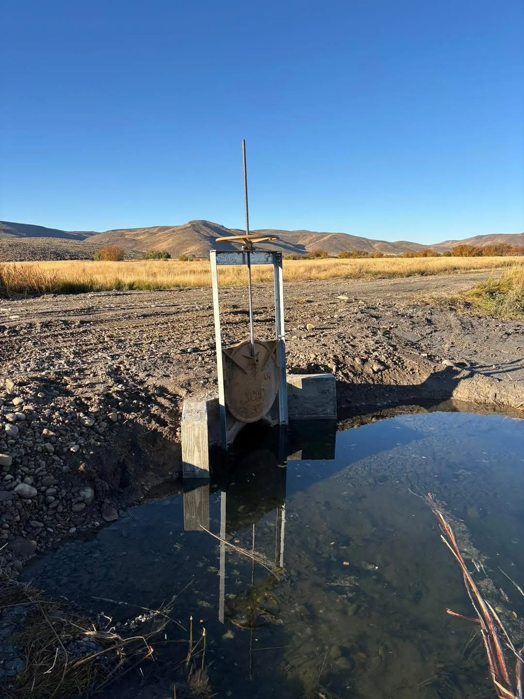 Last week, our construction team poured a new concrete headgate structure - that we also designed - on a working farm. 🚜💧

Headgates help landowners manage irrigation diversions, protect agricultural operations, and balance water needs for crops, w